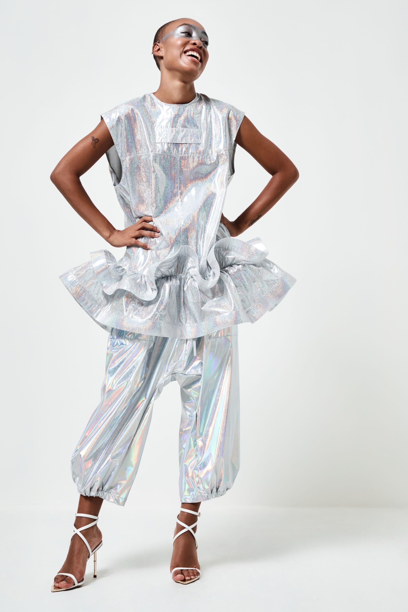 gray metallic sleeveless high-neck relaxed ruffled shiny top