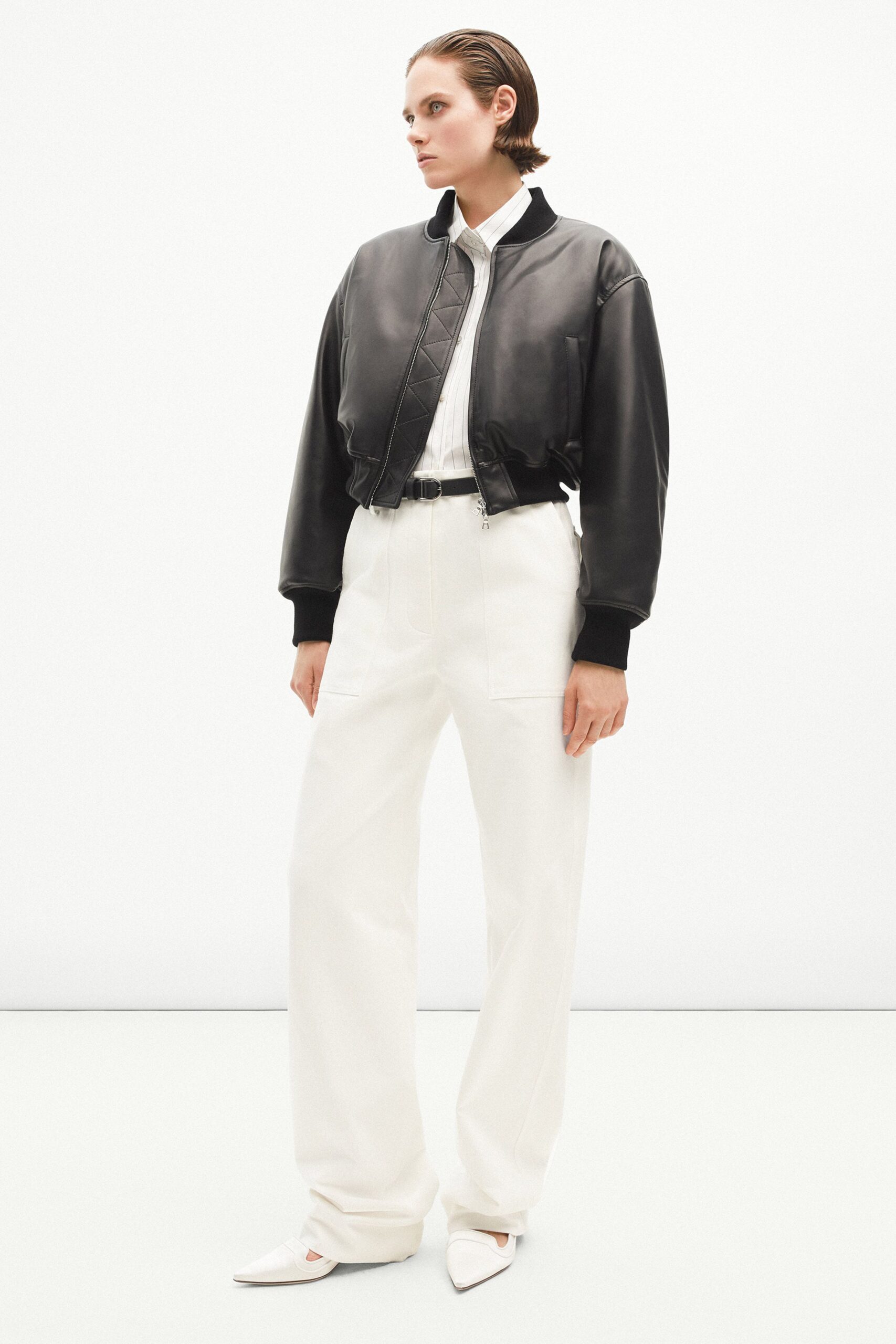 black leather jacket white shirt pants