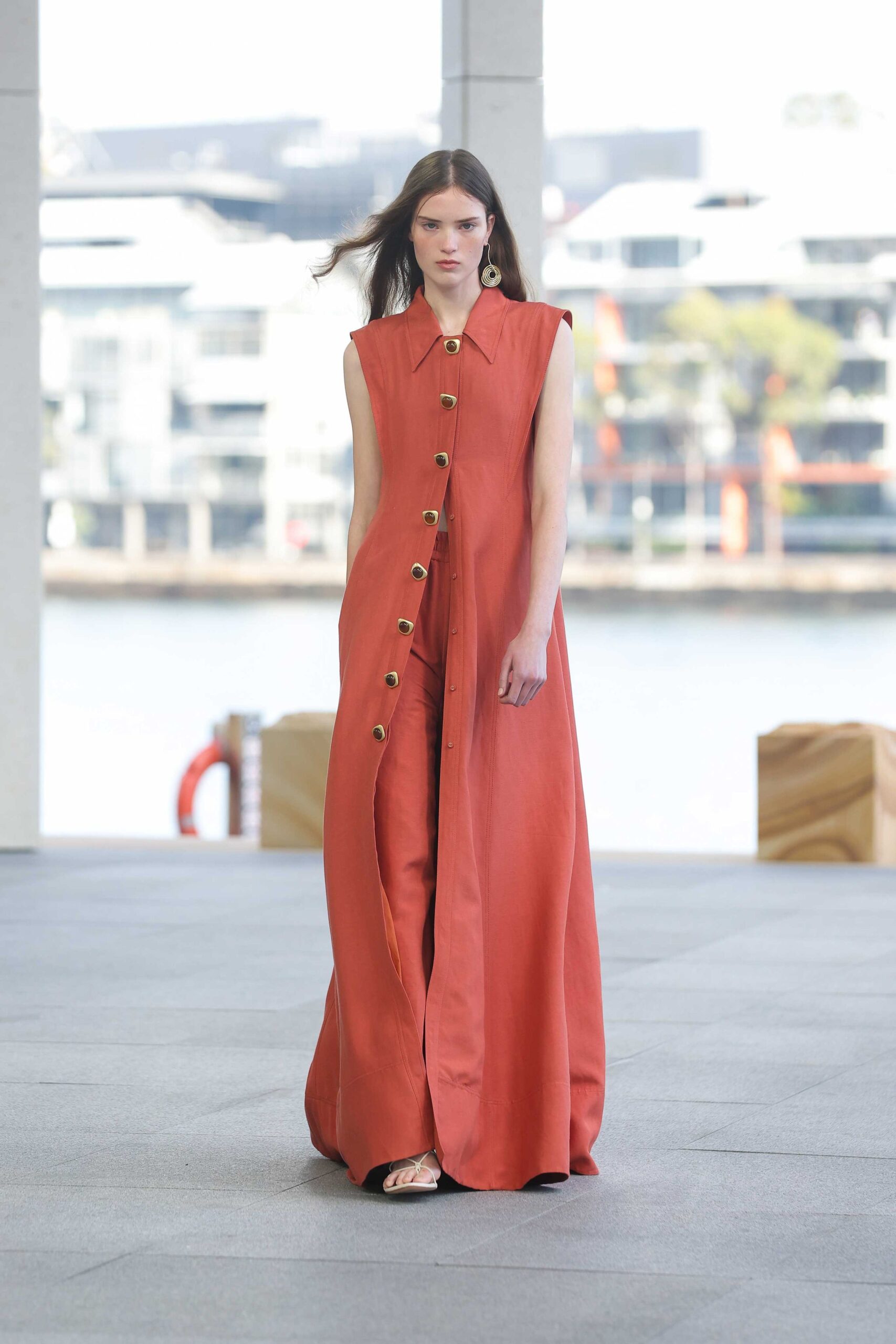 red silk sleeveless collared structured buttoned straight-leg jumpsuit