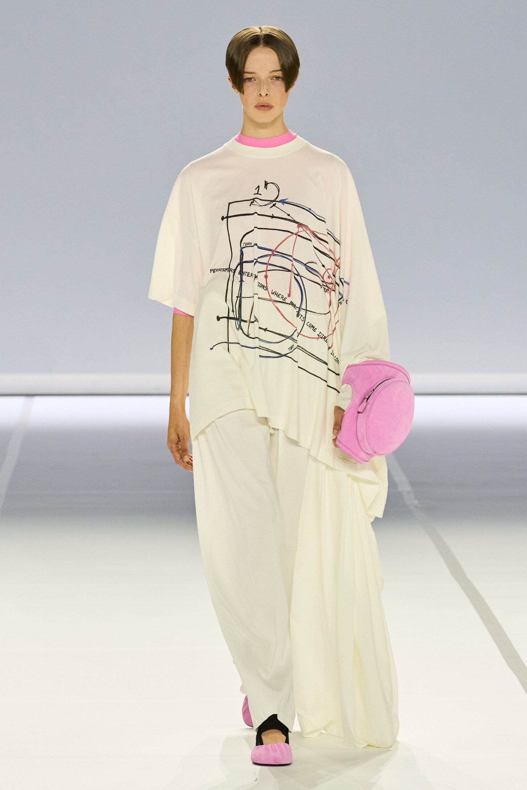 white relaxed top with pink accents