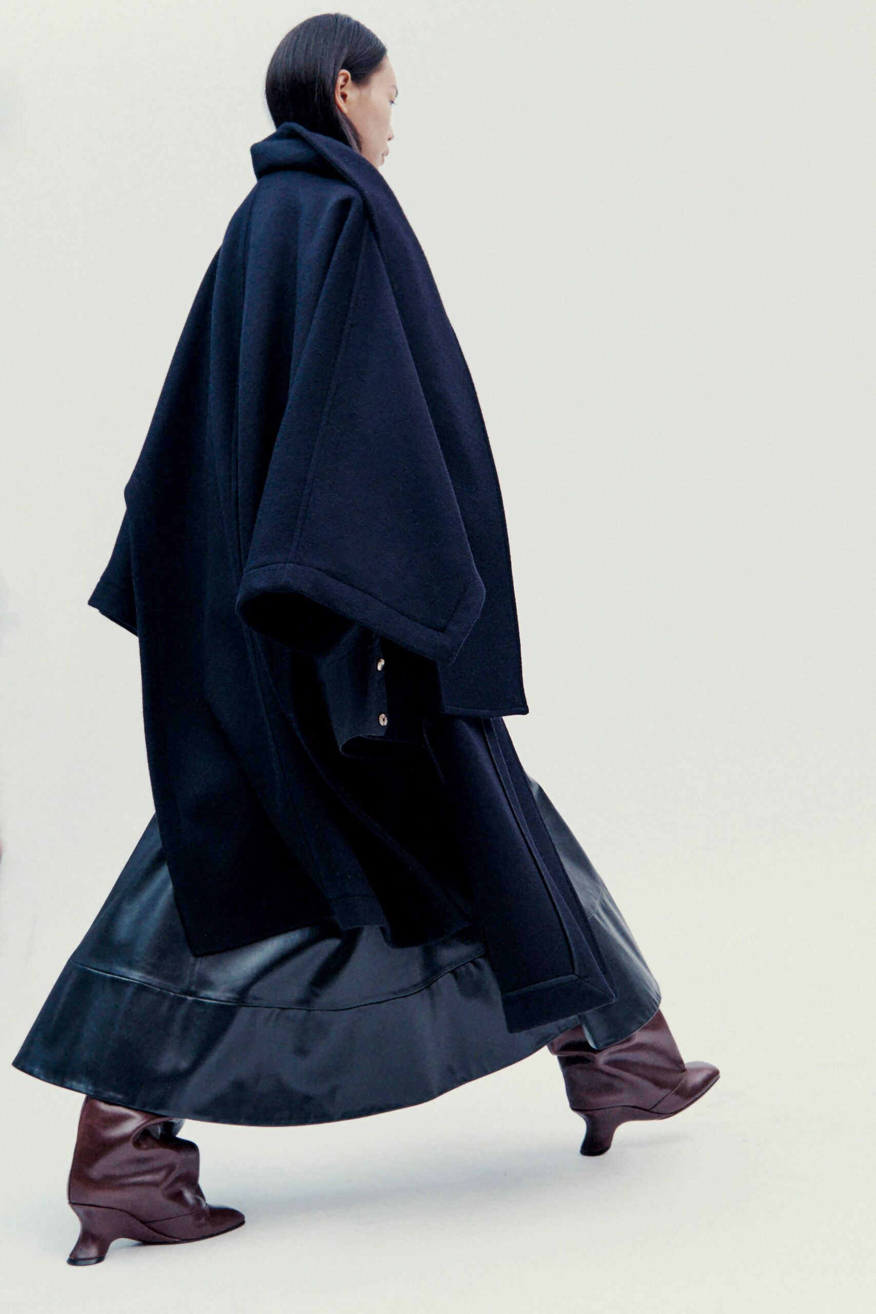 black wool coat black leather dress brown boots