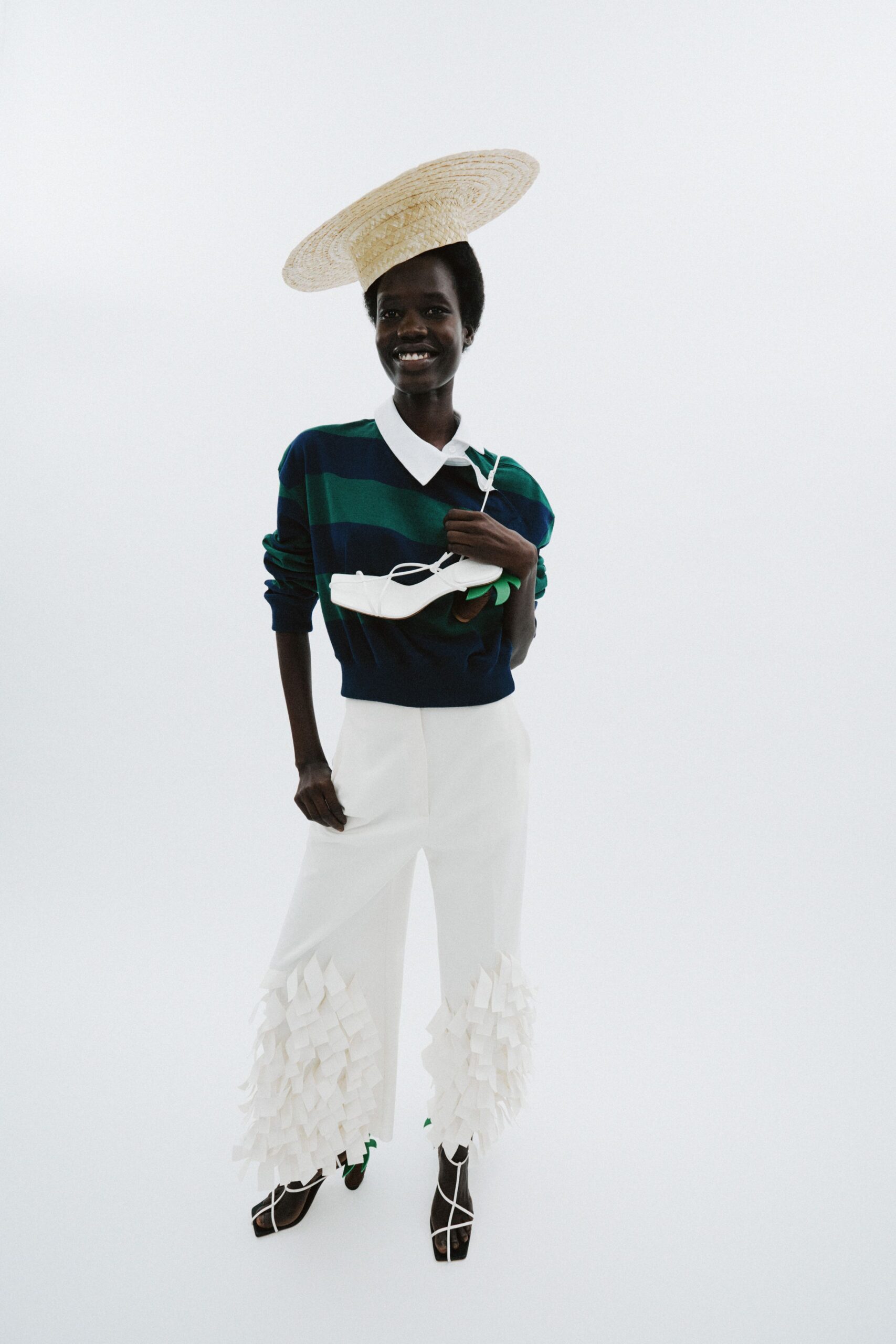 blue striped sweater white pants