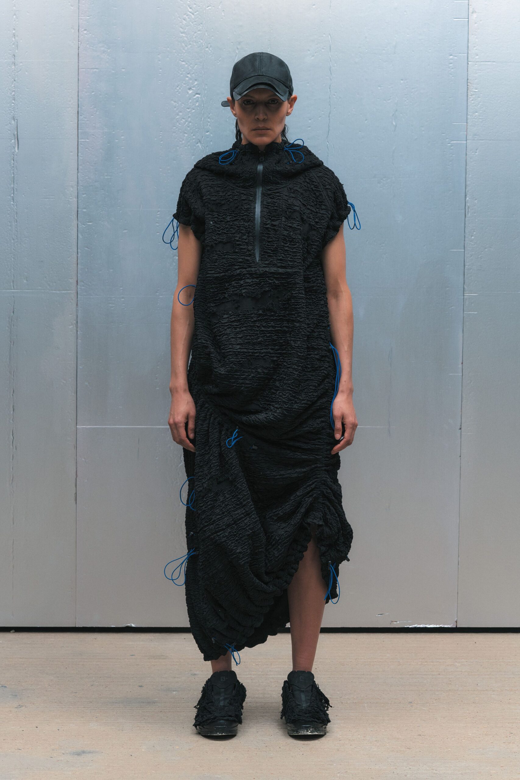 black cotton short-sleeve high-neck relaxed zippered draped dress