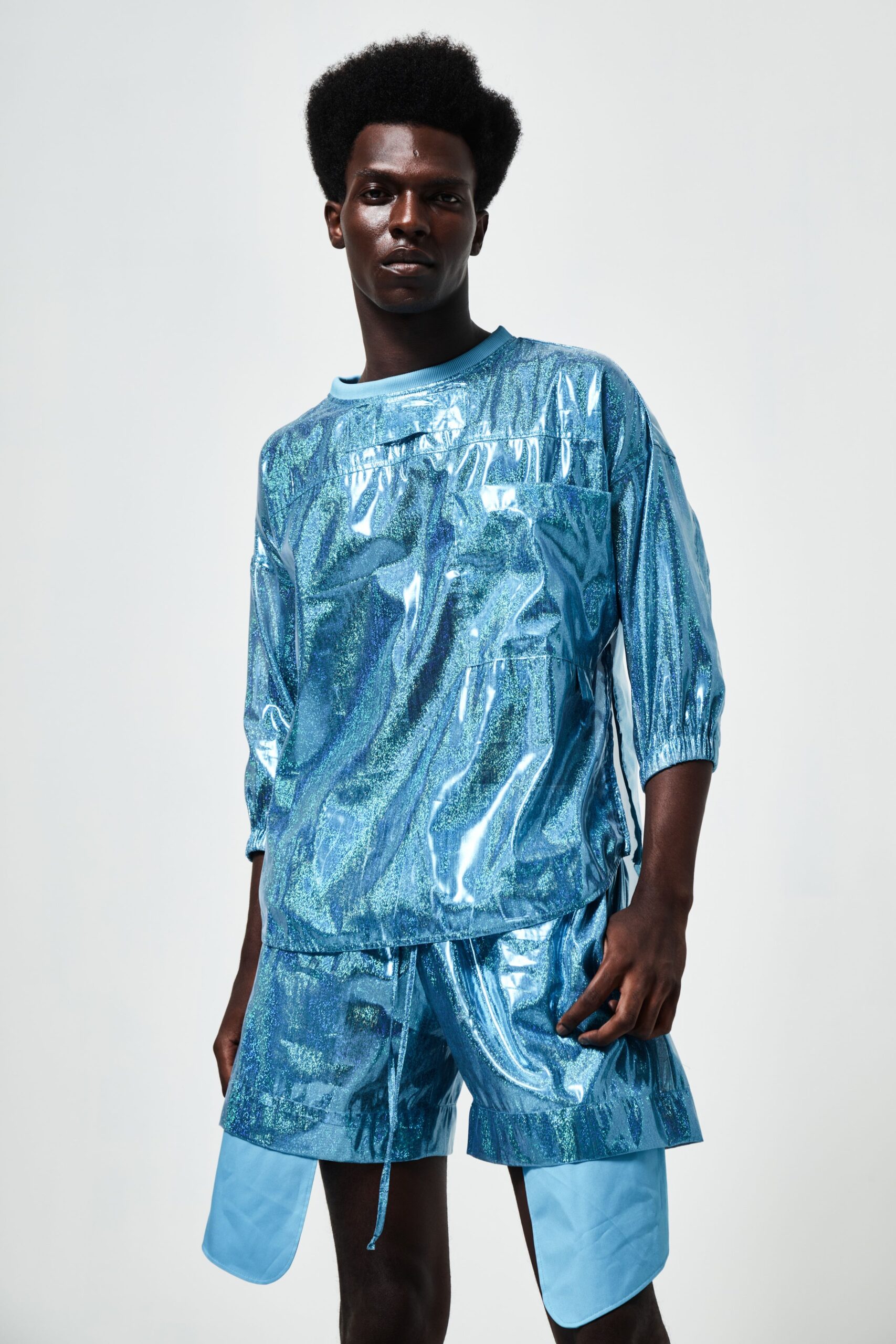 blue vinyl long-sleeve collared relaxed shiny top