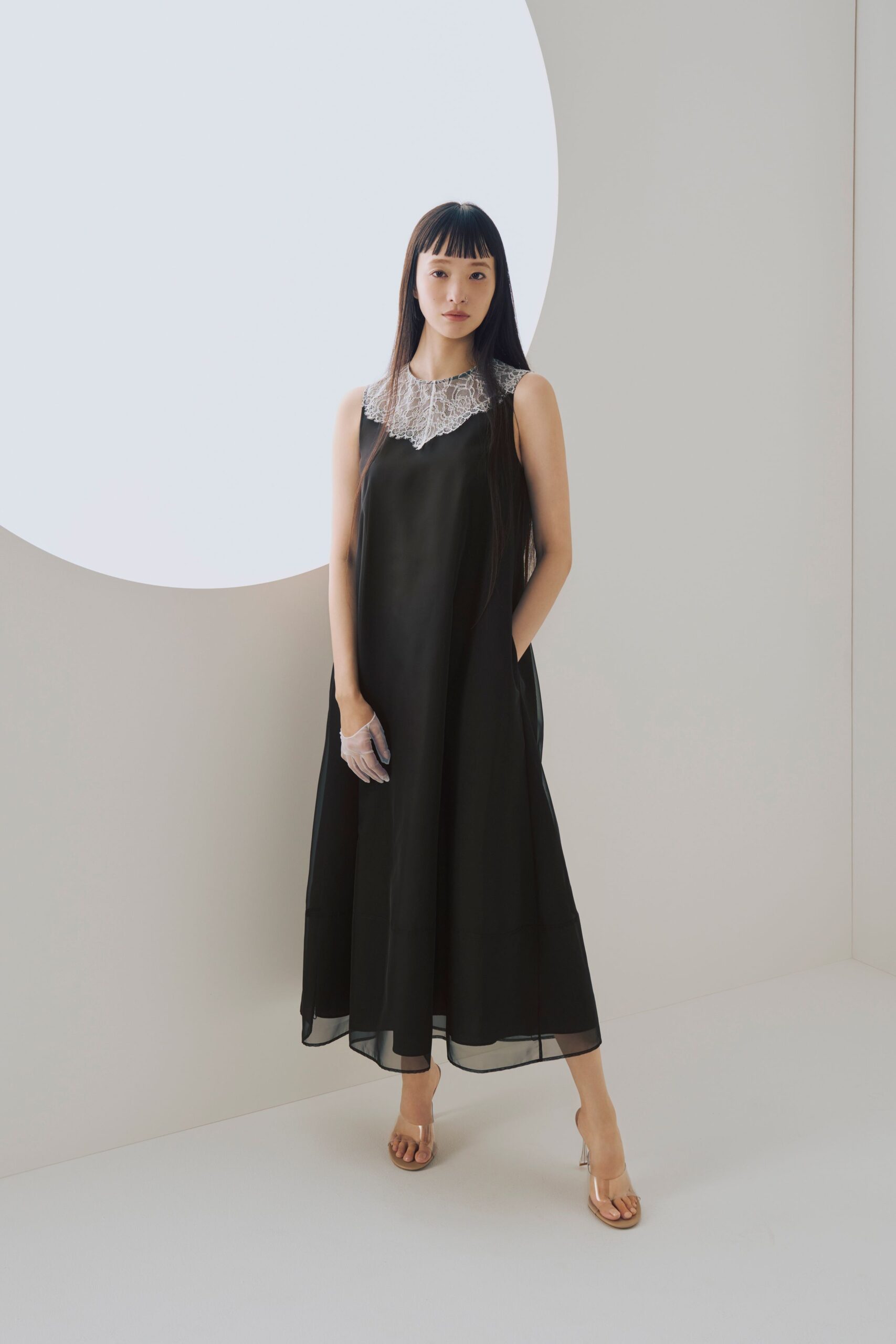 black midi dress with gold shoes