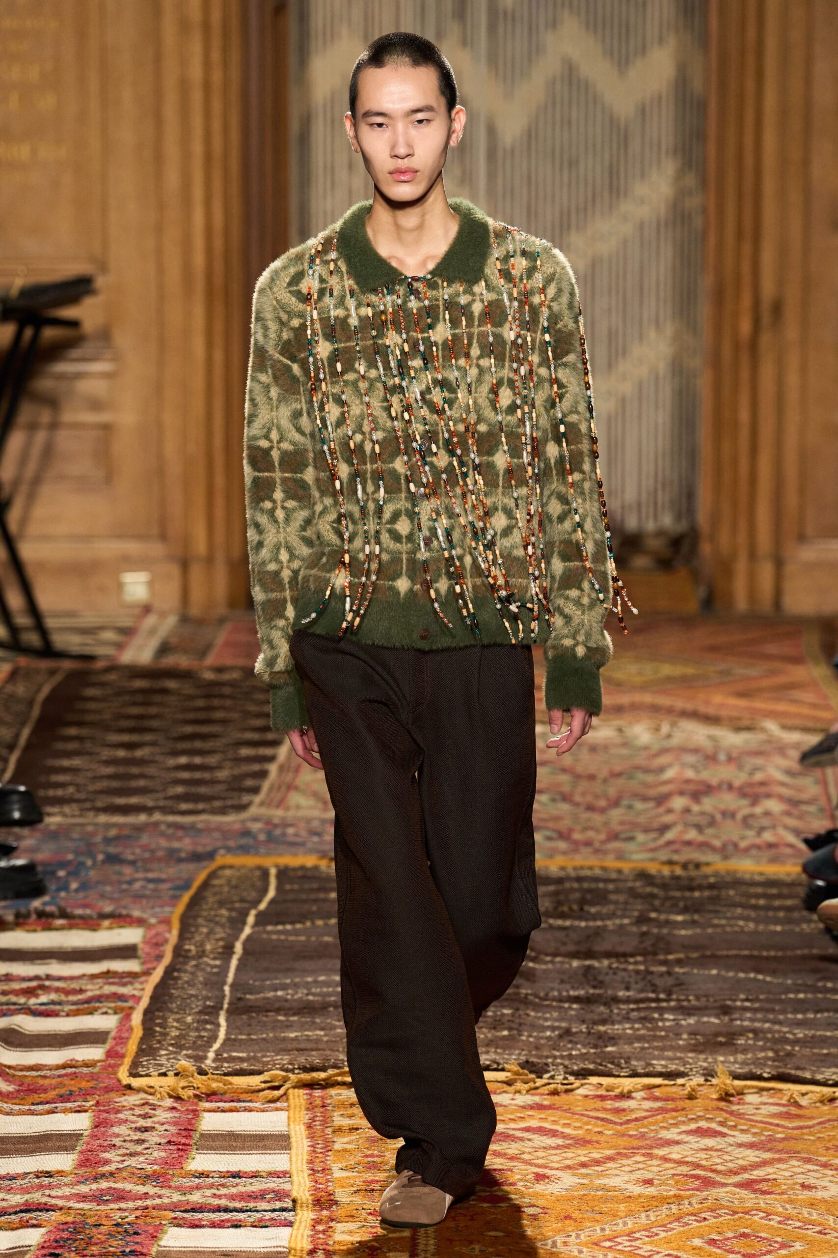 green wool relaxed sweater with black pants