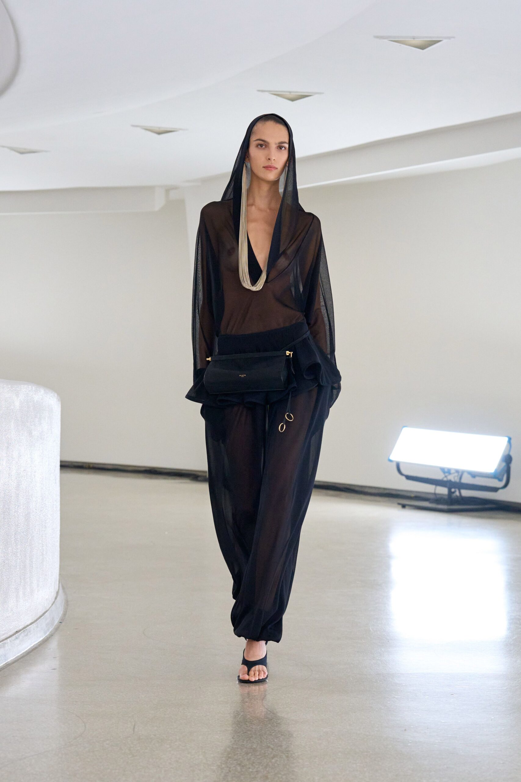 black sheer jumpsuit with bag