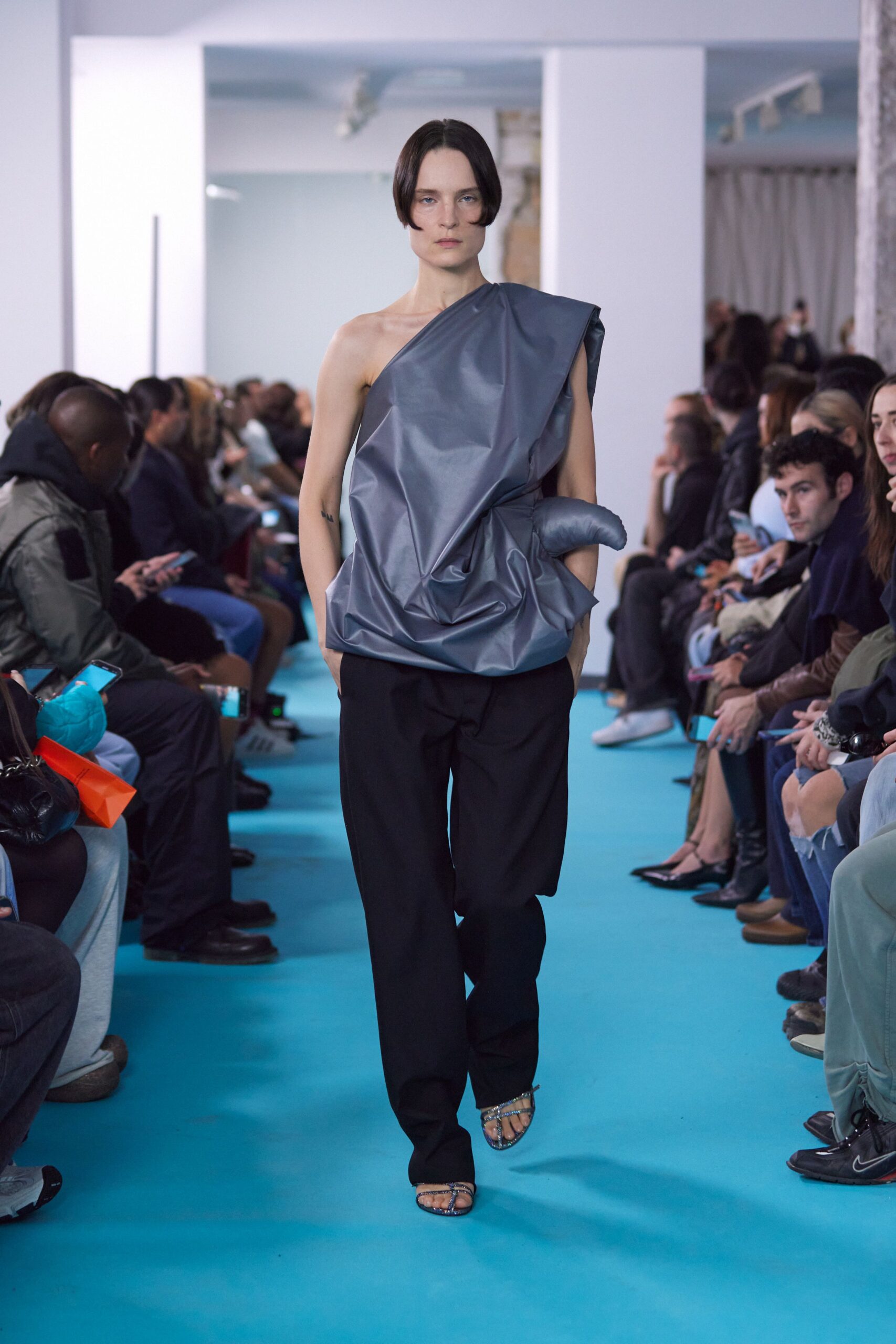 gray asymmetric top black pants