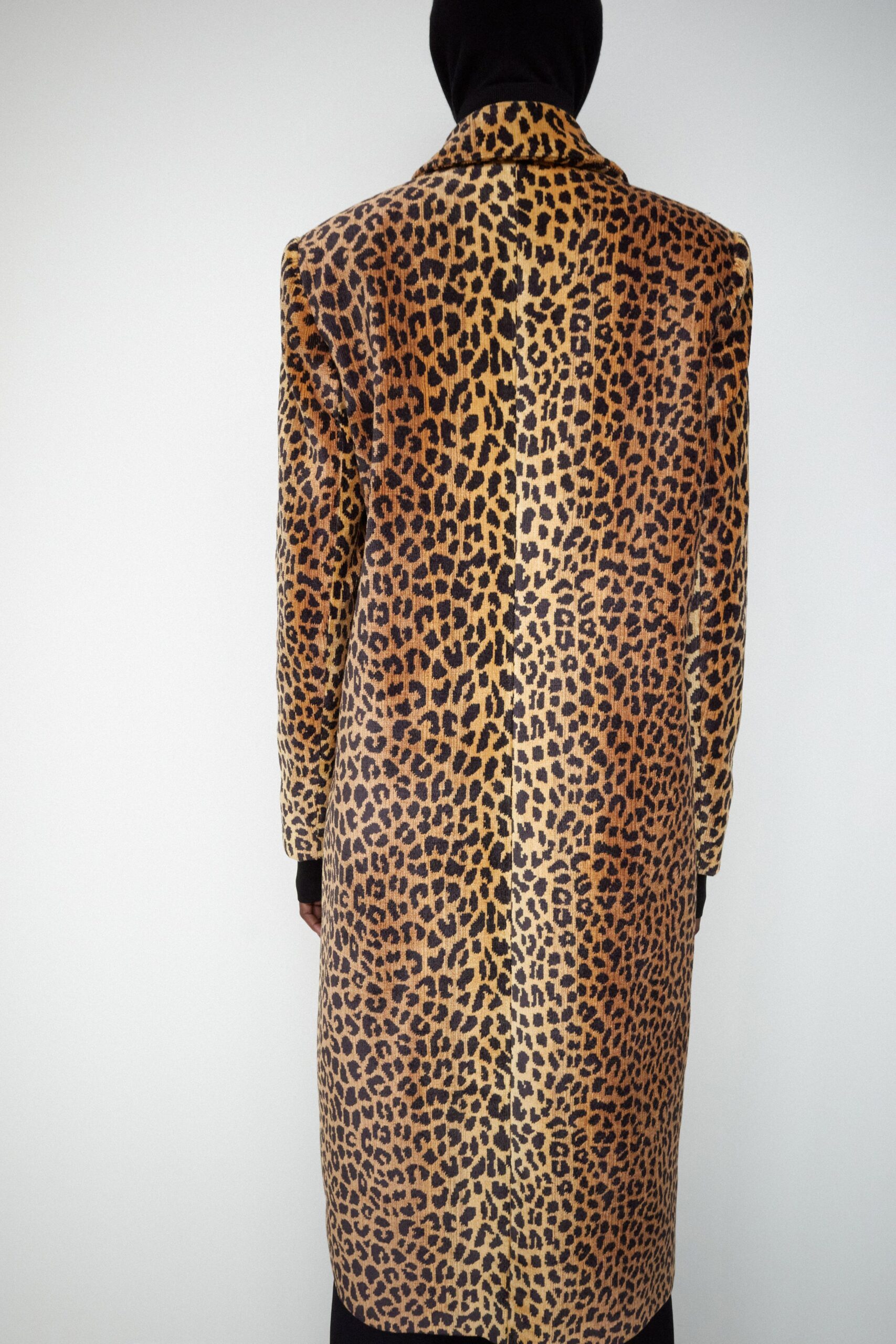brown and black animal-print coat