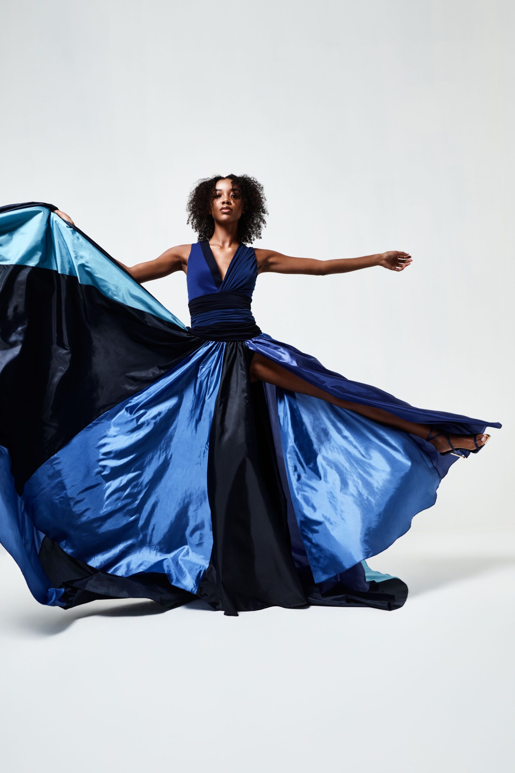 blue silk sleeveless gown