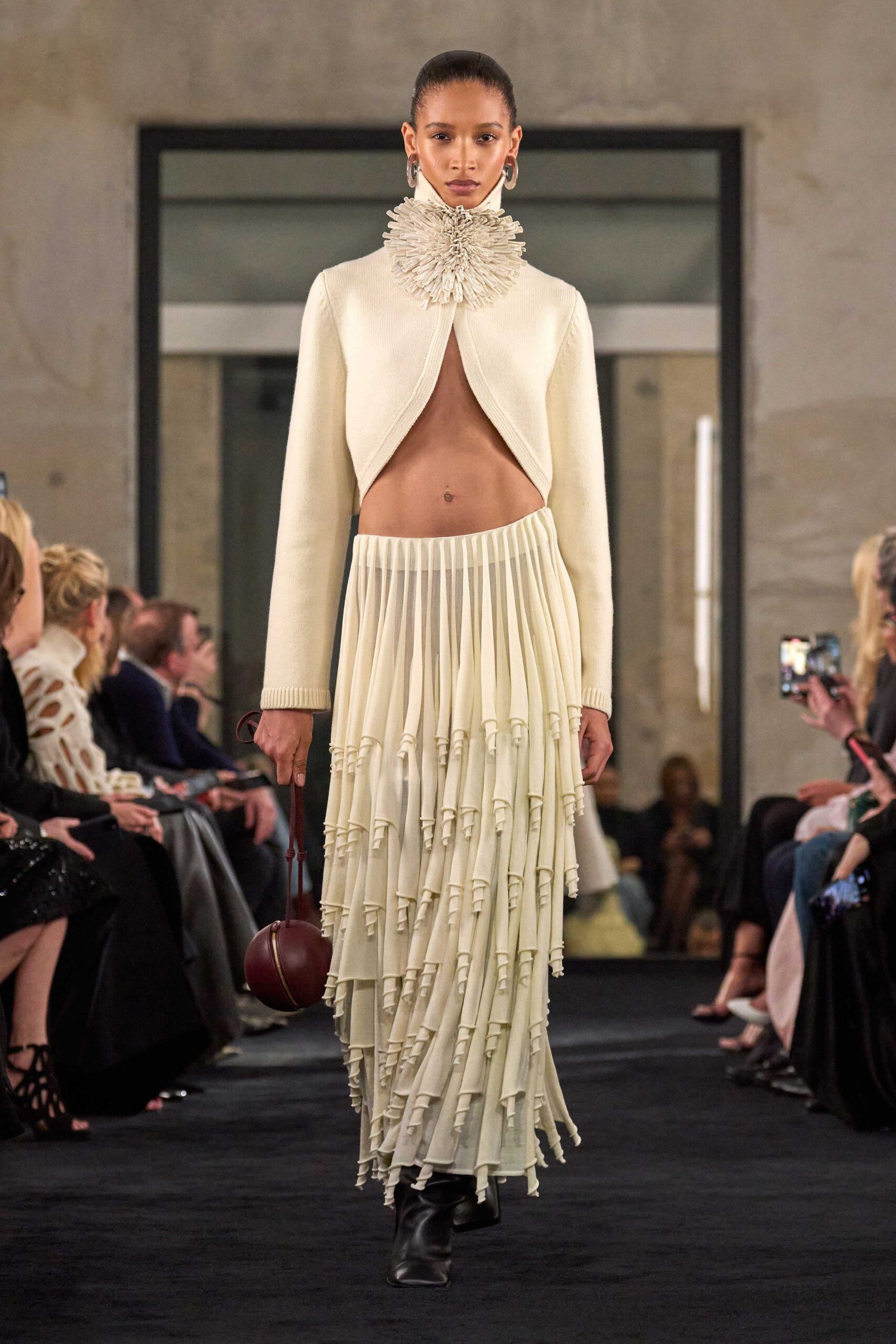 white wool sleeveless high-neck fitted draped jacket