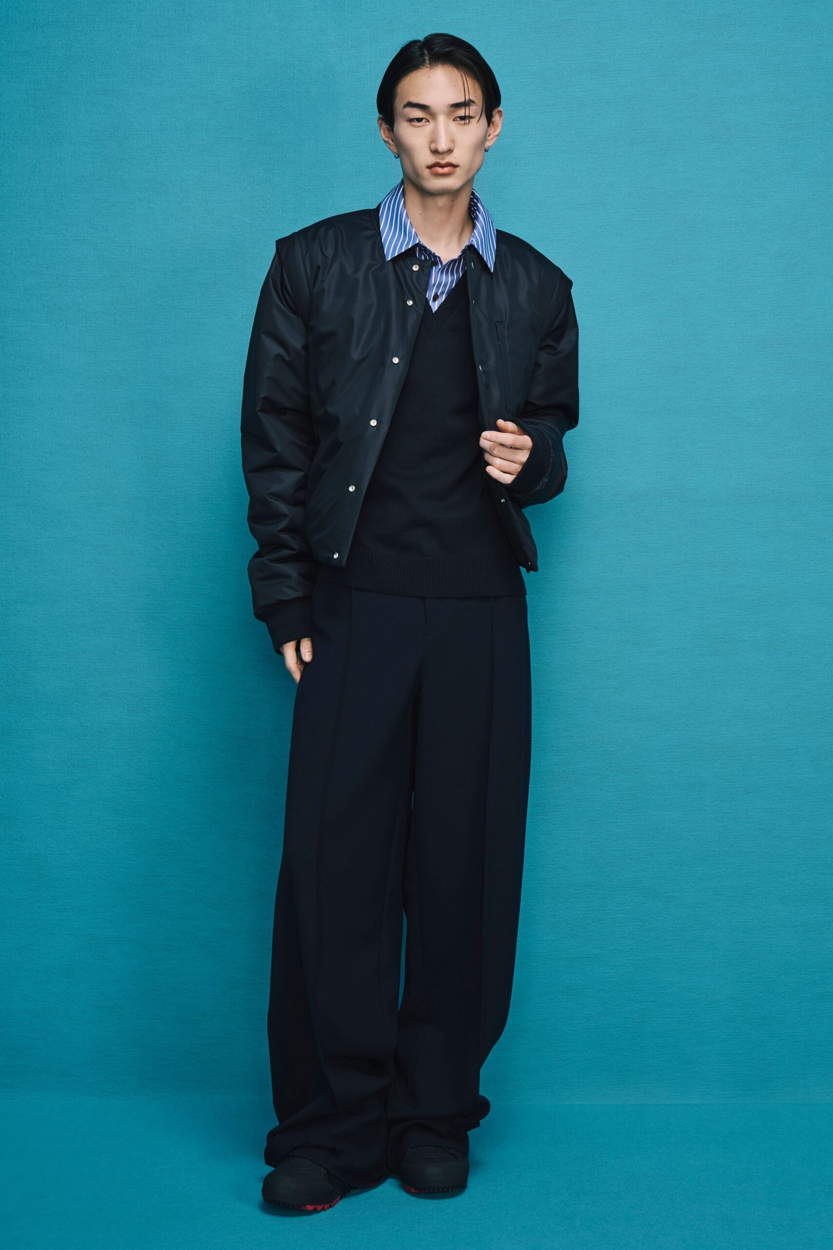 black relaxed jacket with blue shirt