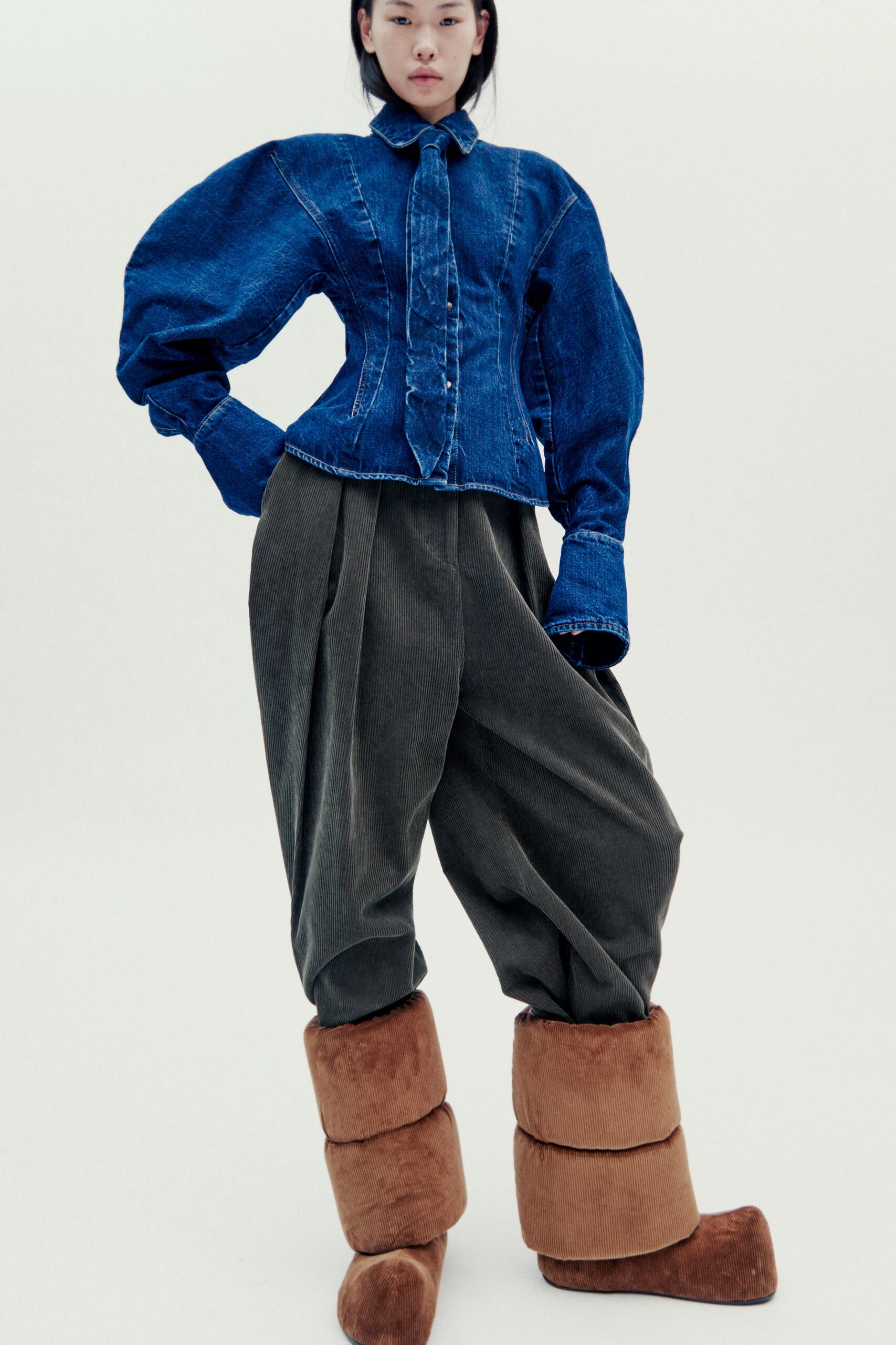 blue denim shirt gray pants brown boots