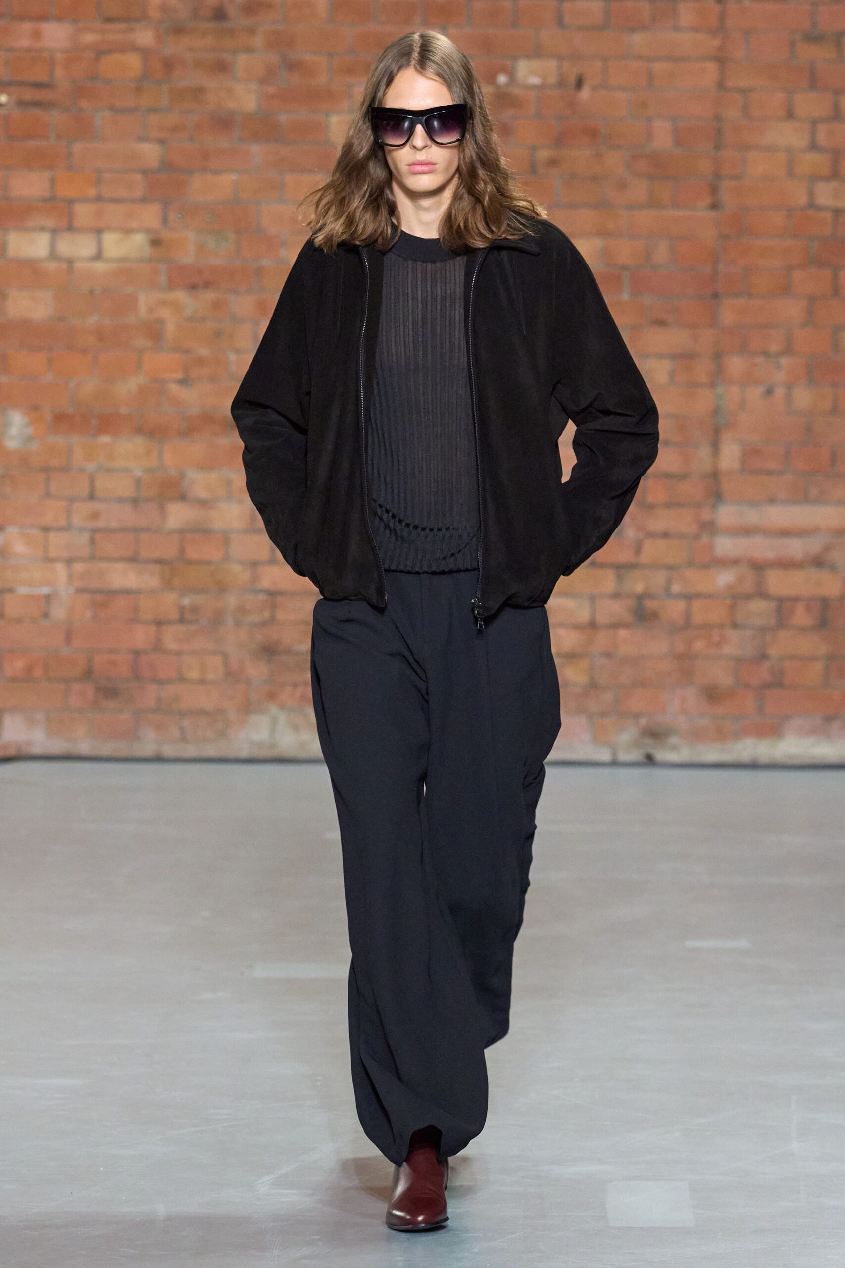 black suede jacket with wide-leg pants