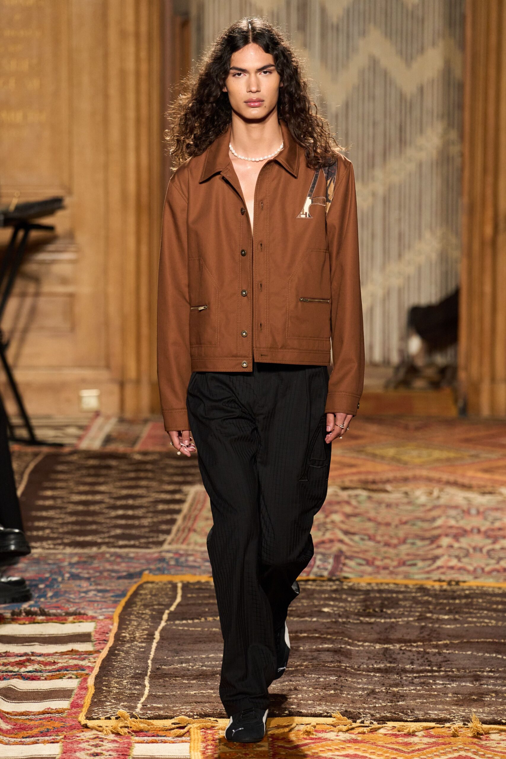 brown relaxed jacket with black pants