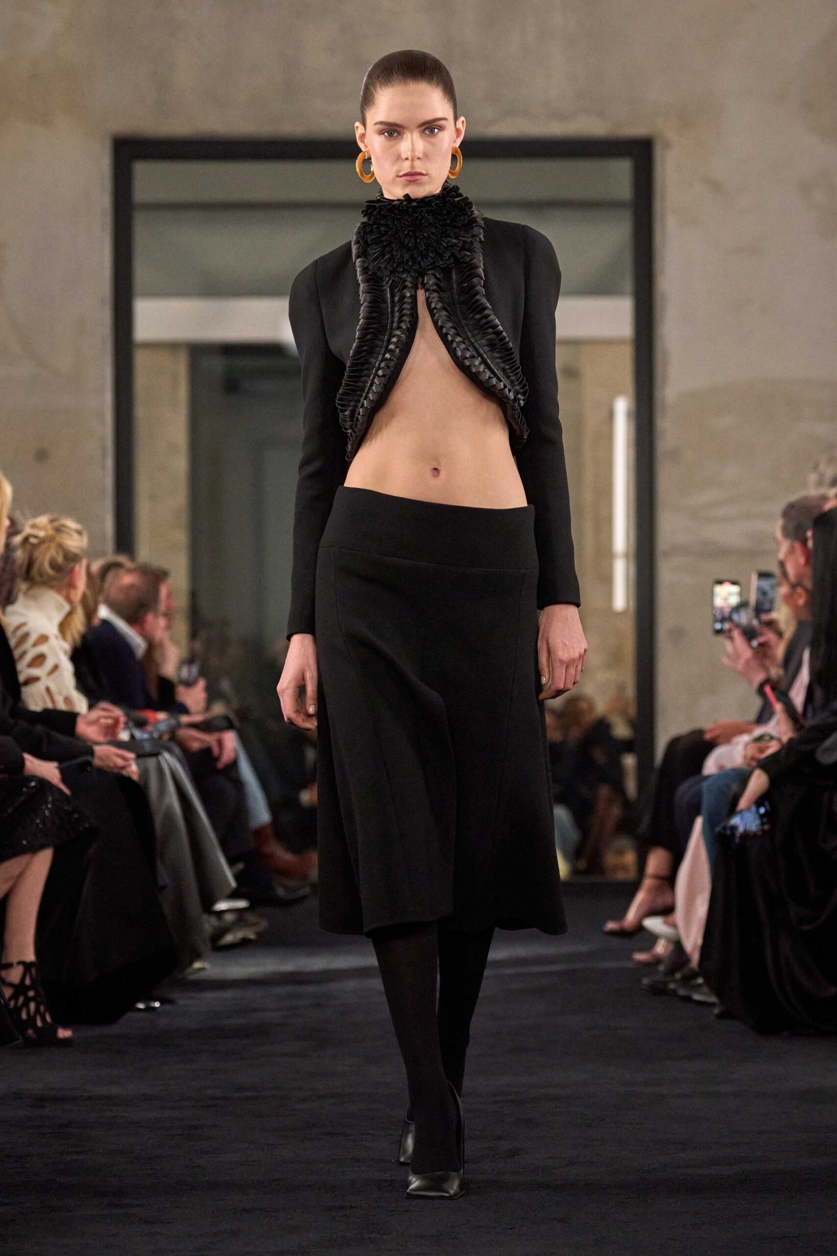 black fitted top and skirt