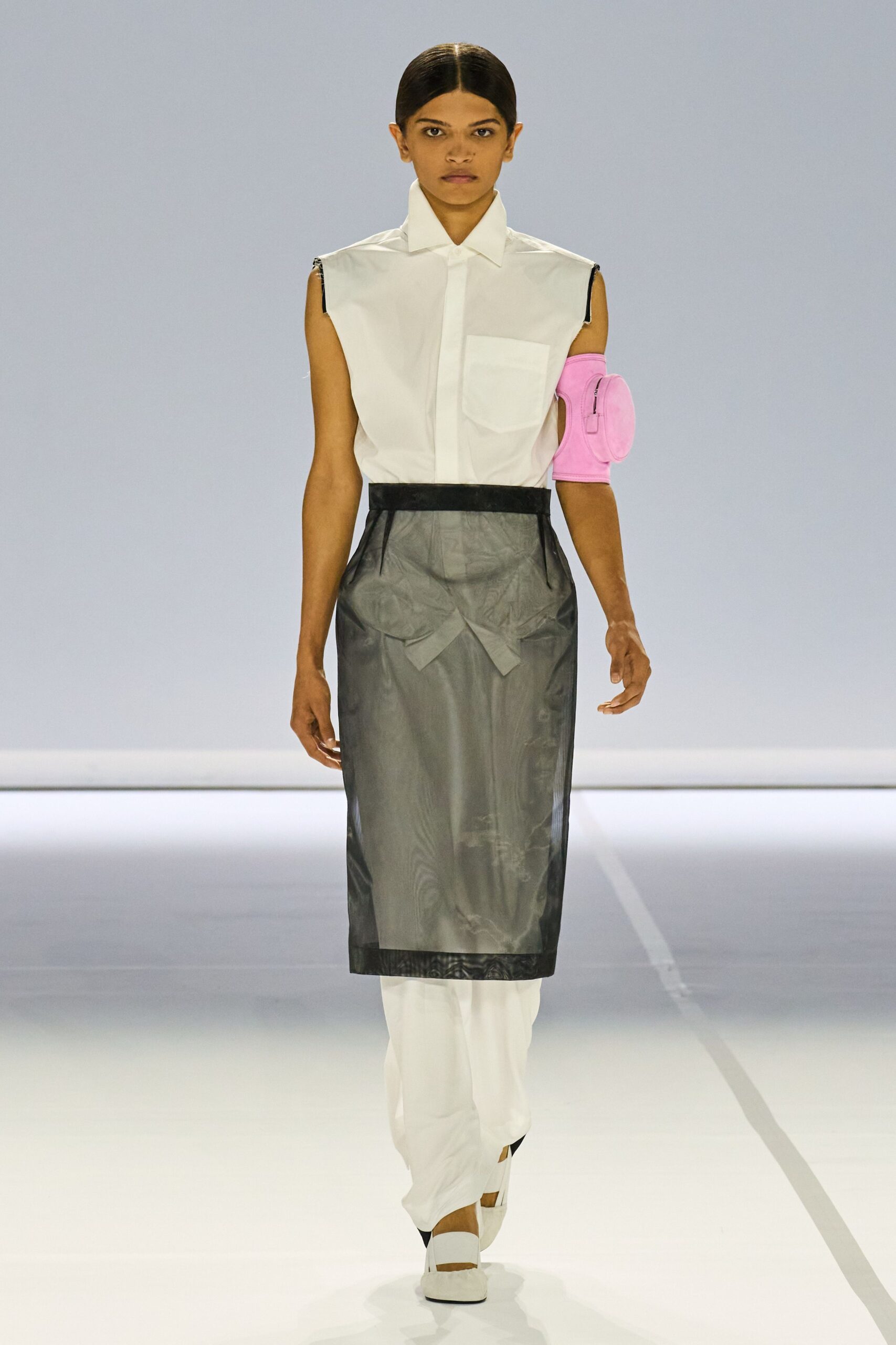 white shirt black vinyl skirt