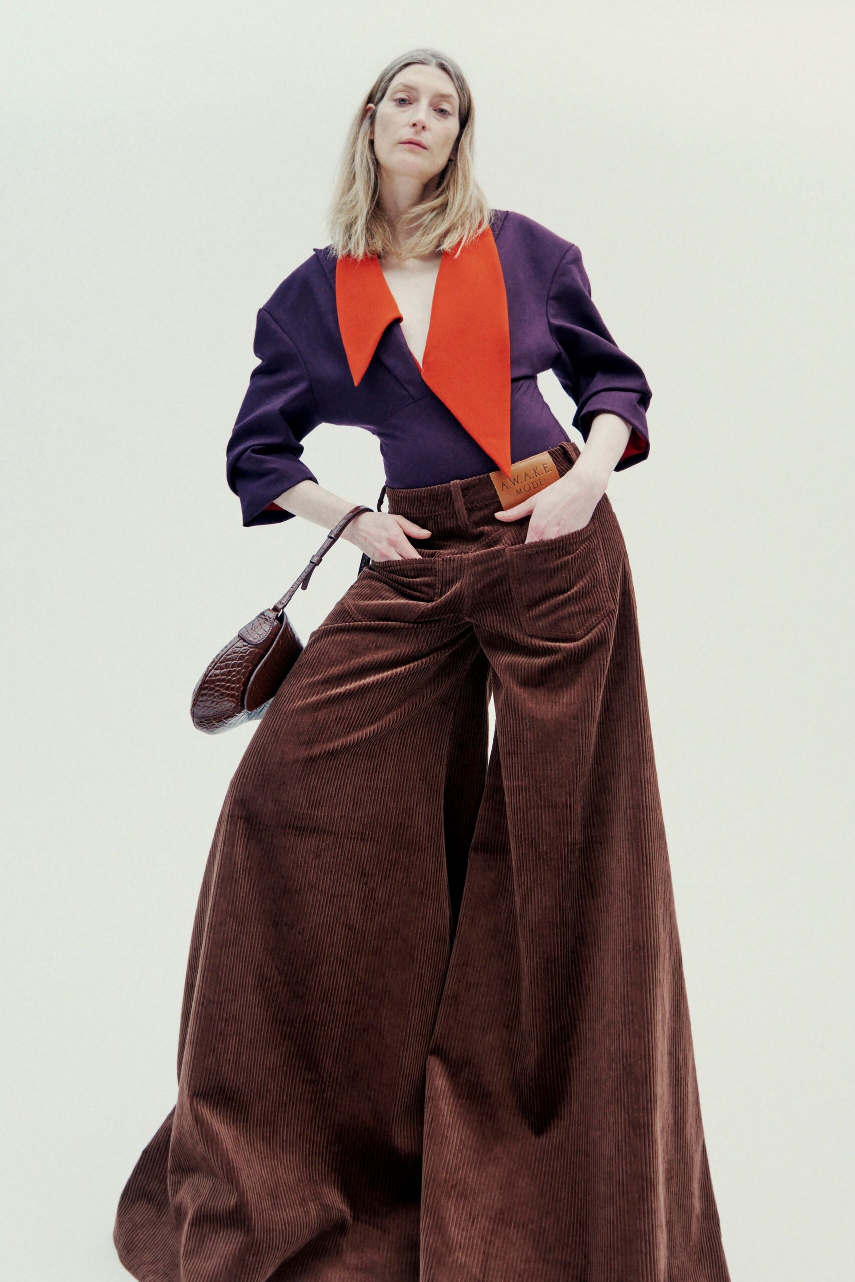 purple and red fitted top with wide-leg pants