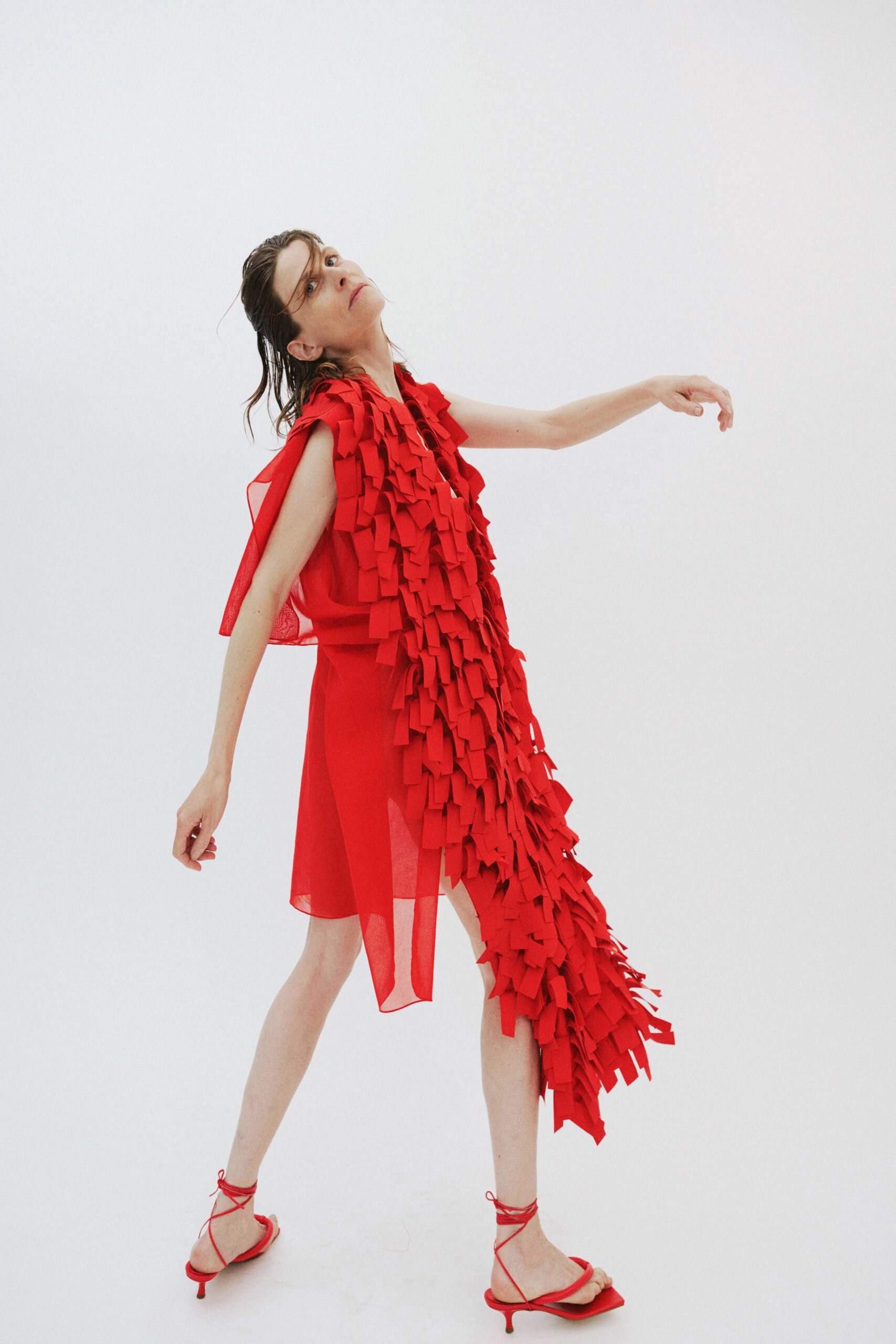 red silk sleeveless v-neck fitted ruffled flowing dress