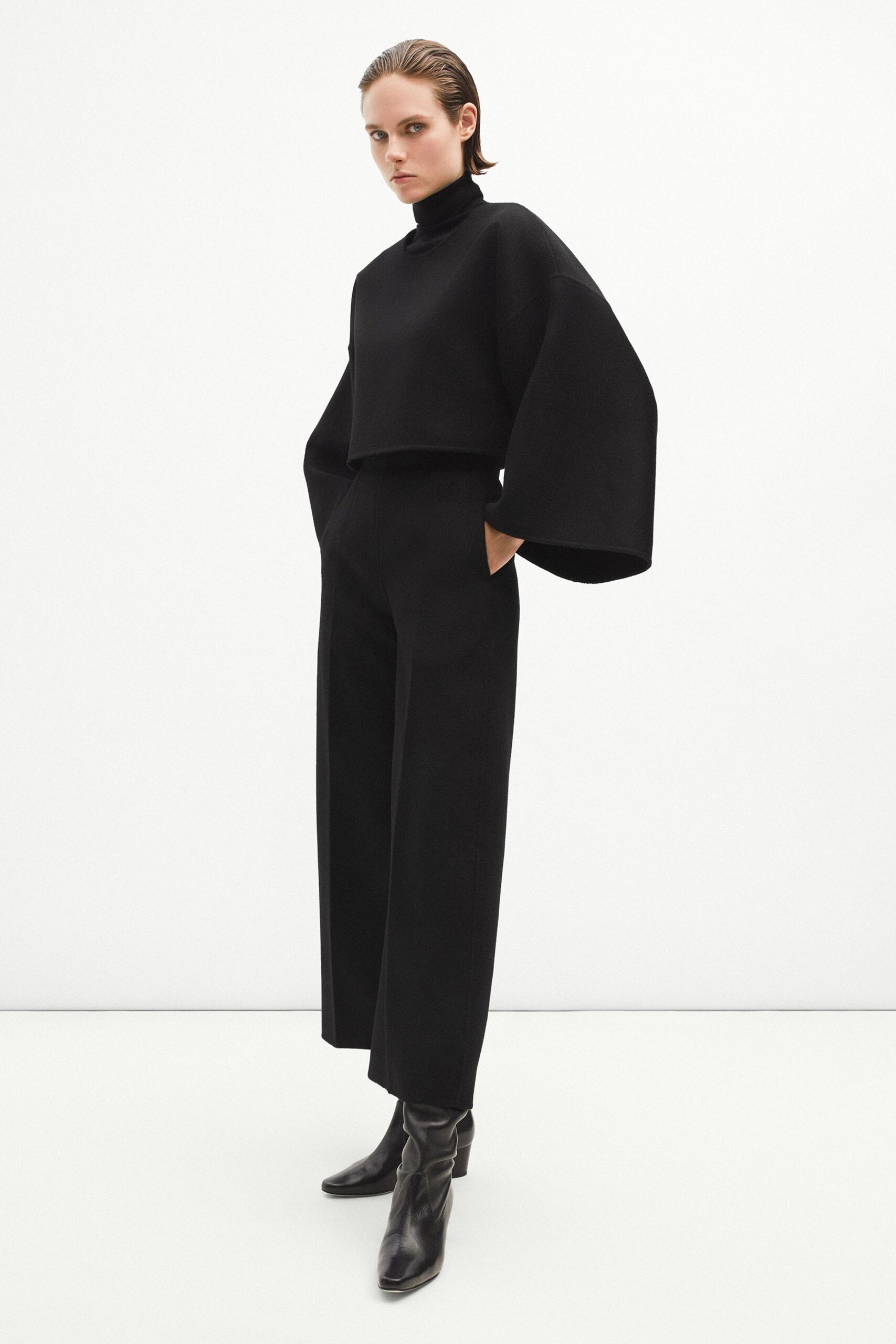 black cropped top with wide-leg pants