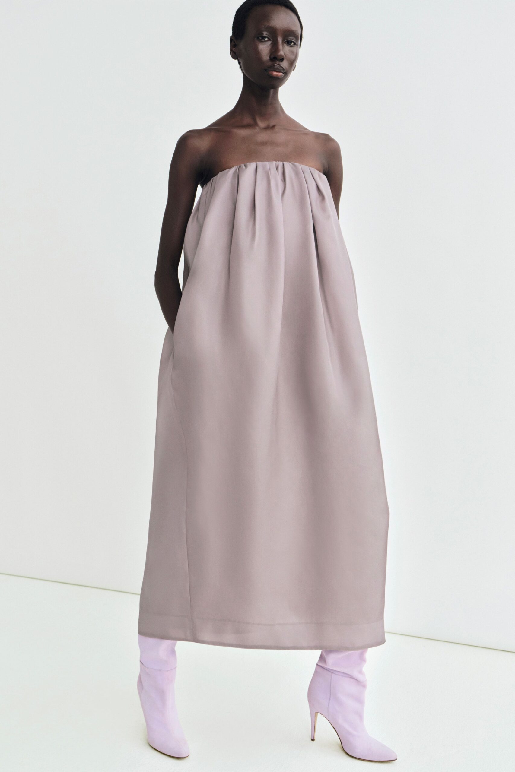 pink silk sleeveless strapless relaxed draped pockets dress
