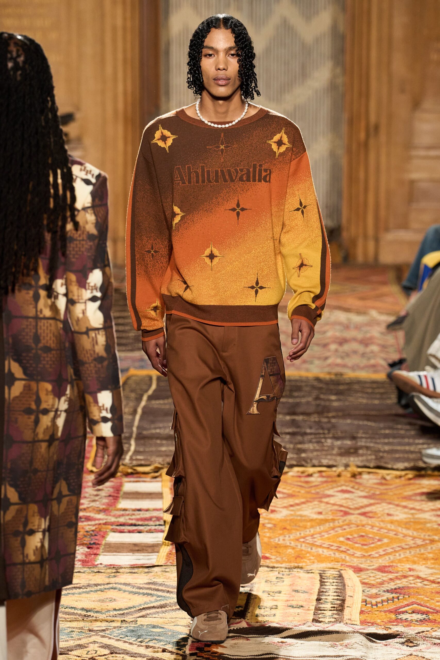 brown color-blocked sweater and cargo pants