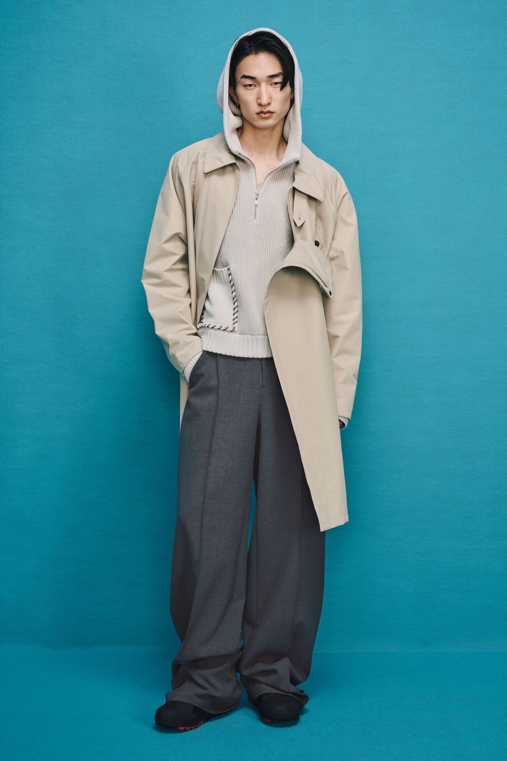 beige coat gray hoodie relaxed pants
