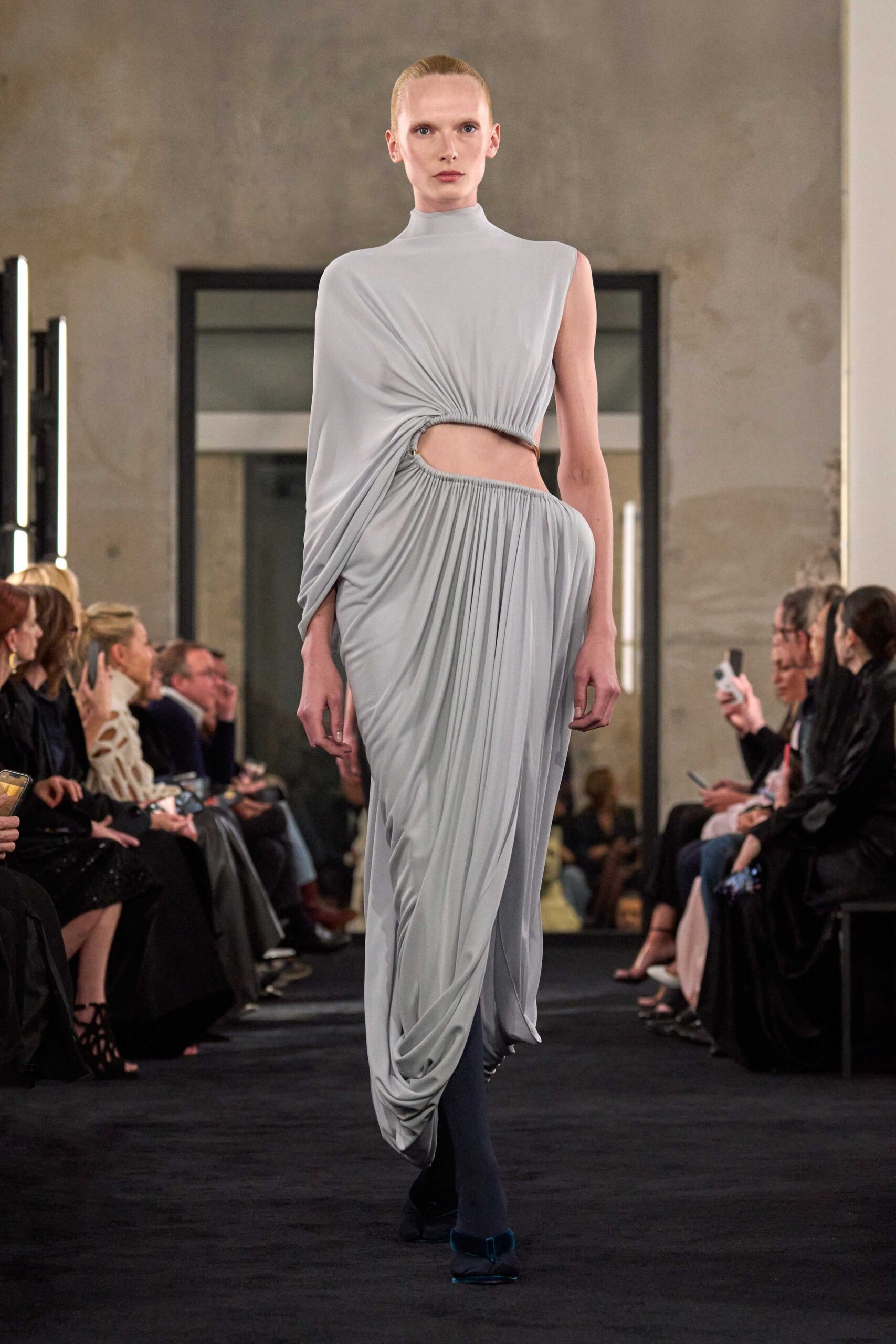 gray silk sleeveless high-neck fitted draped flowing gown