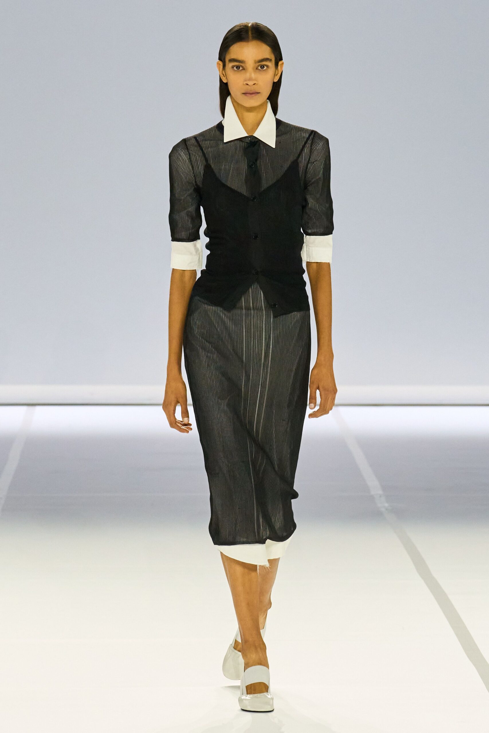 black fitted shirt and midi skirt
