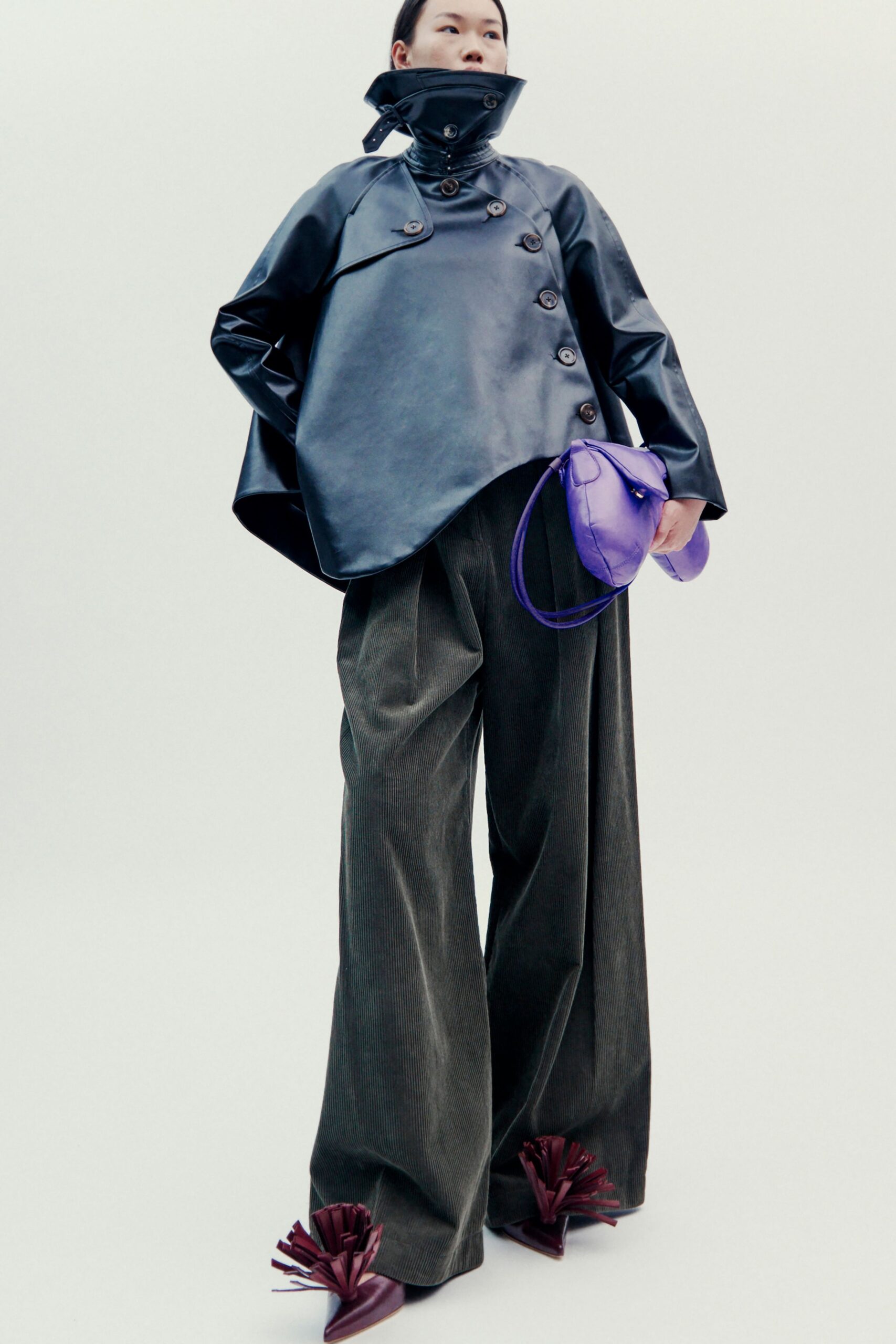 black leather long-sleeve collared relaxed zippered jacket