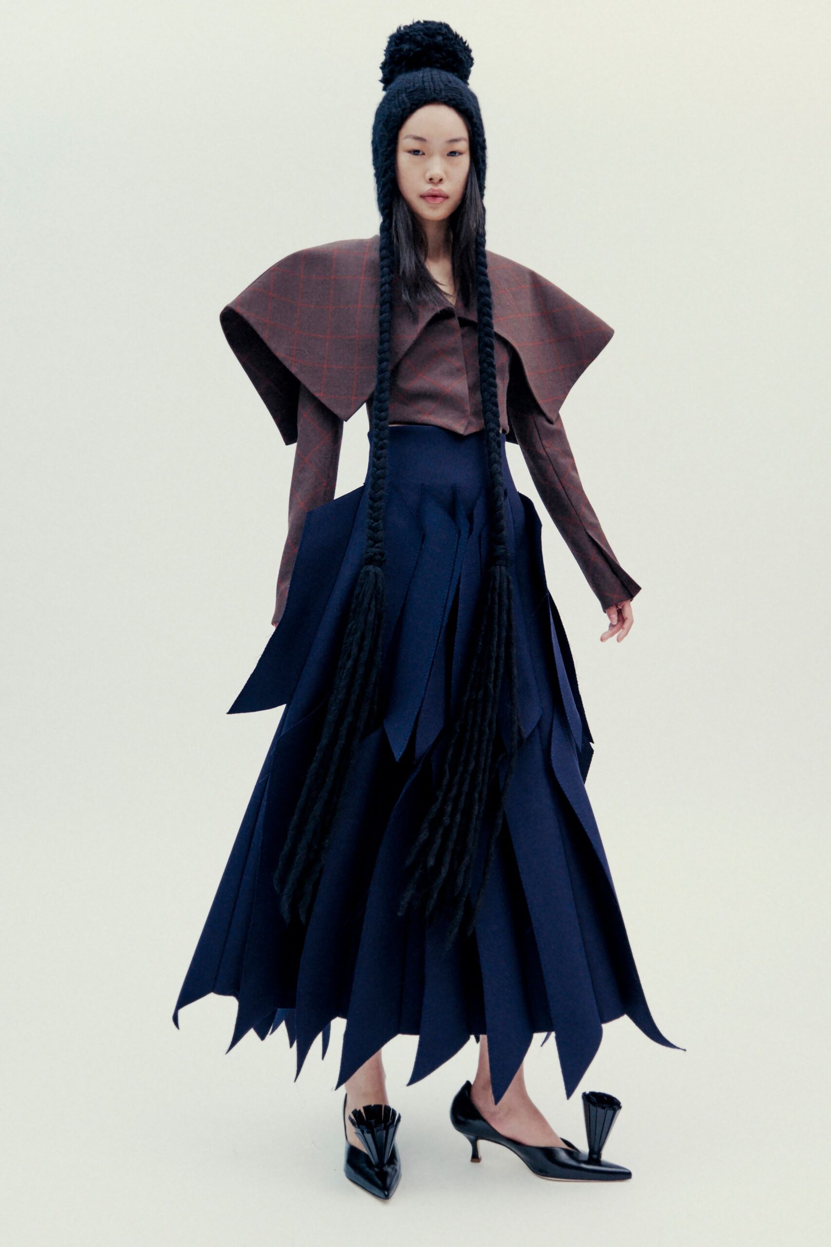 brown collared top with blue layered skirt