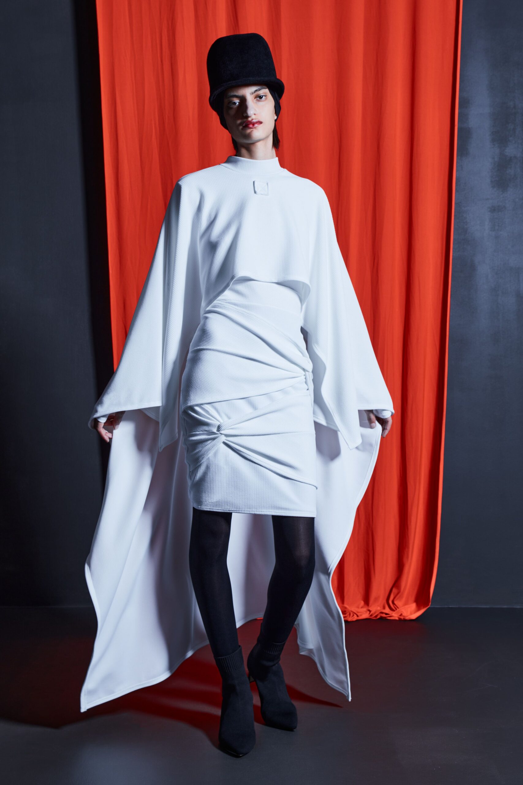 white fitted mini dress with cape
