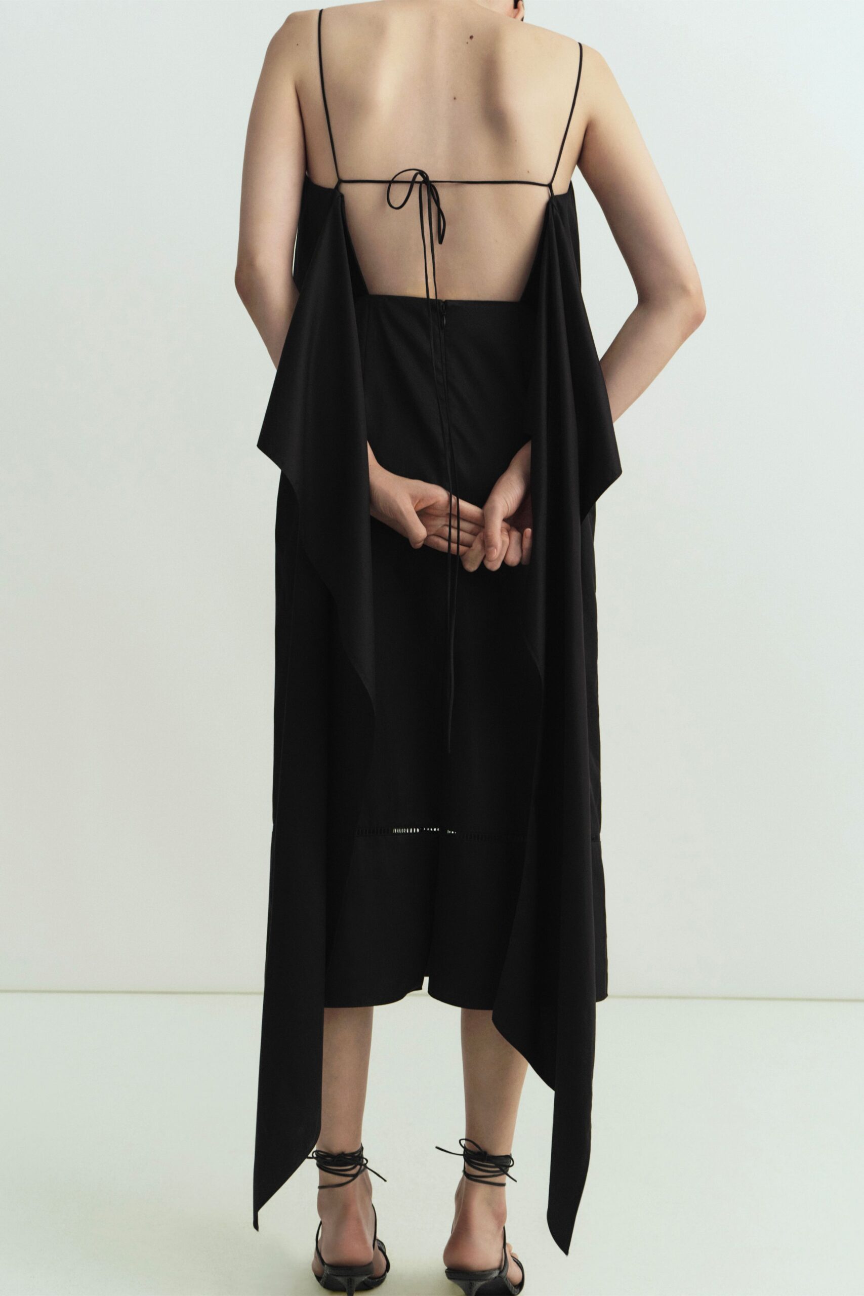 black silk sleeveless dress