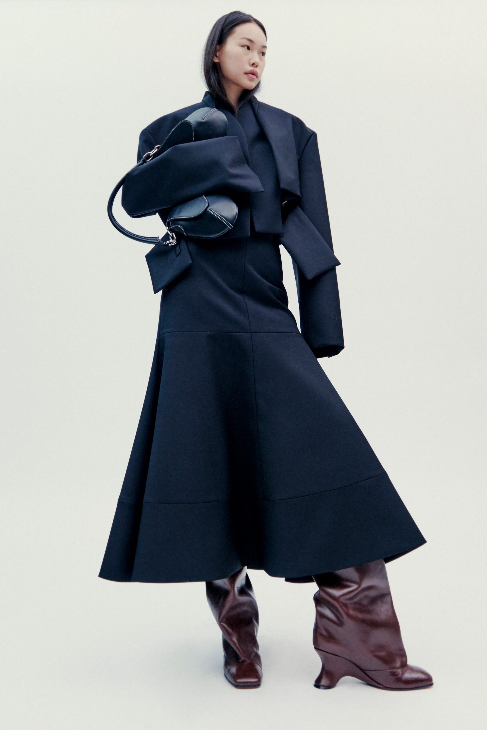 black midi dress with jacket and boots
