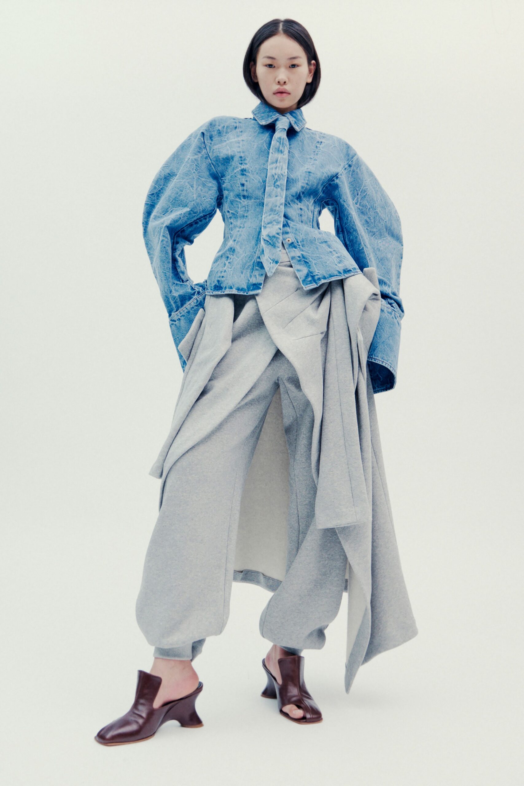 relaxed denim jacket with gray pants