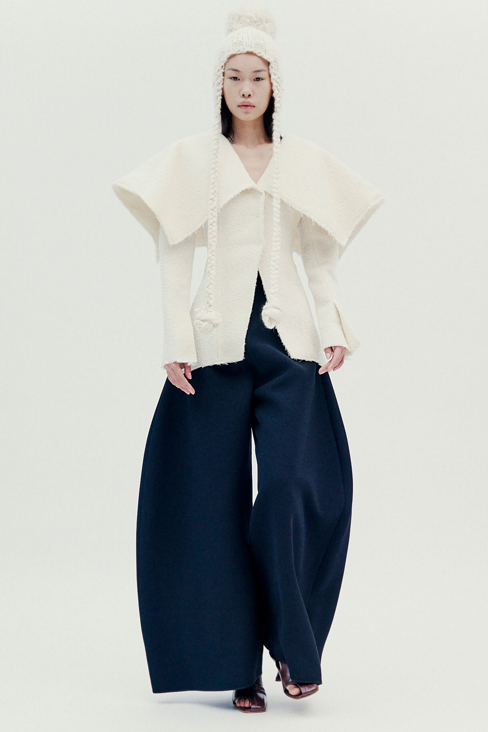 white wool long-sleeve collared structured jacket