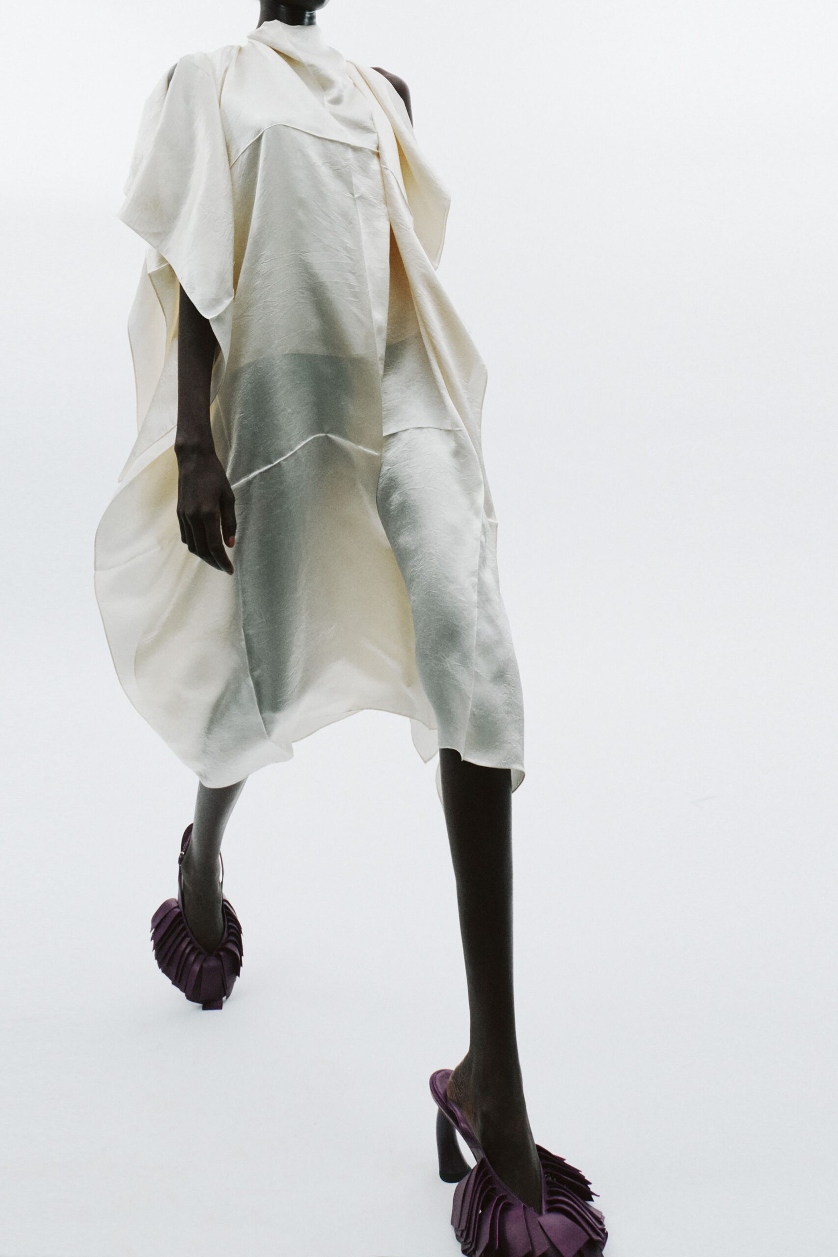 white silk relaxed midi dress with purple shoes