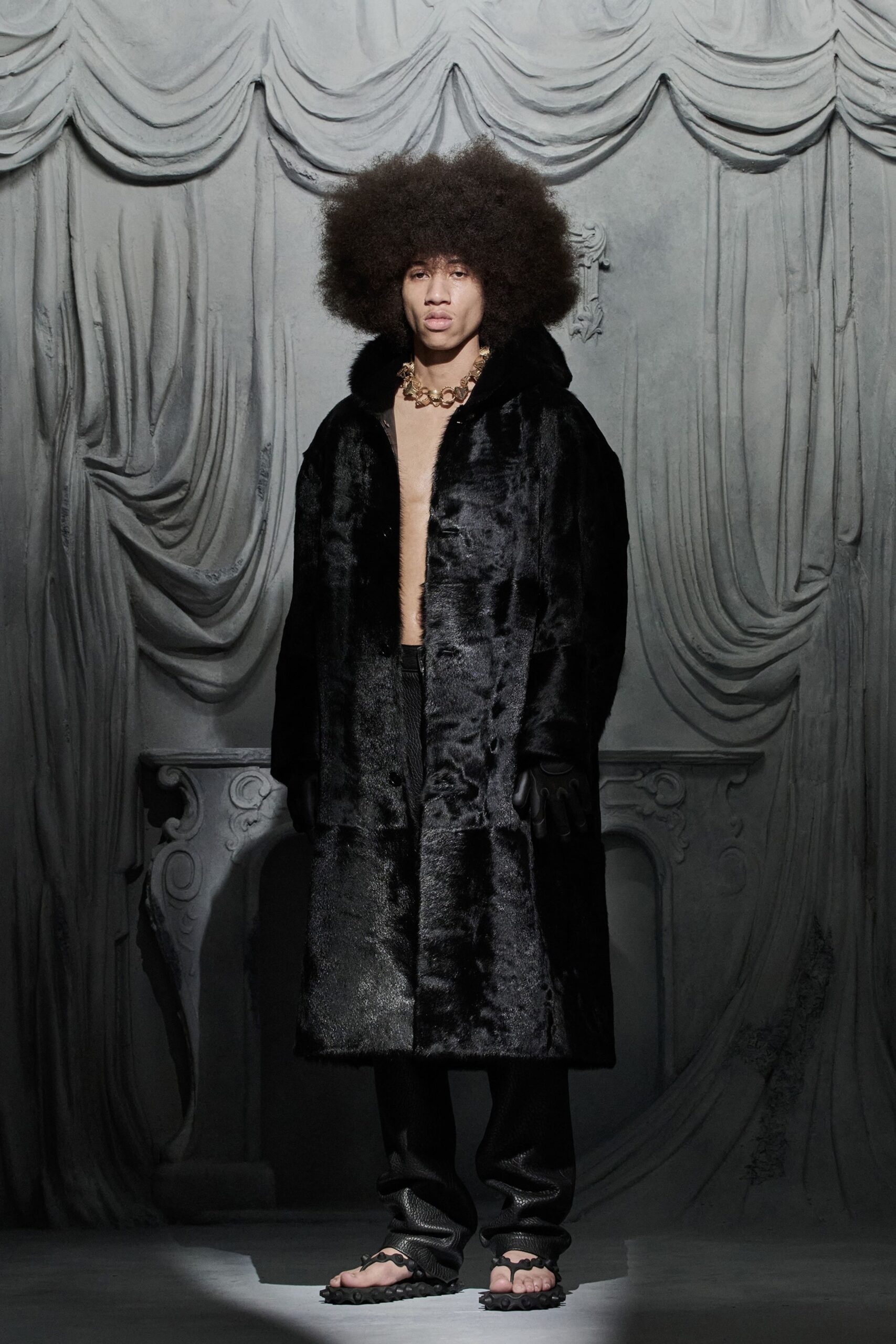 black faux-fur coat with beige top