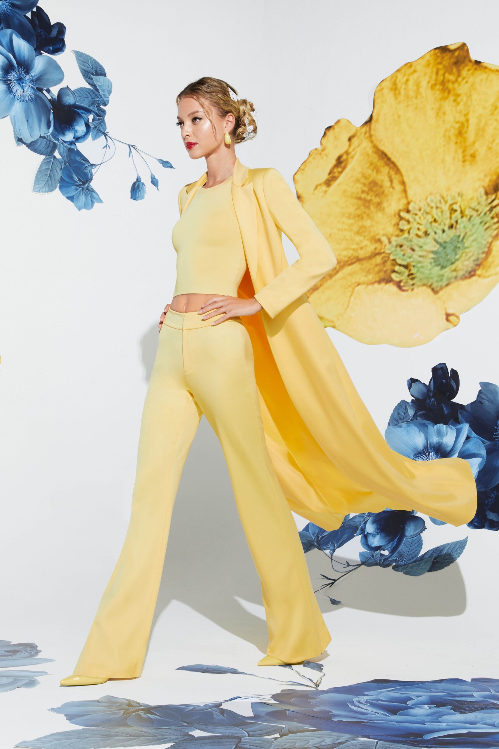 yellow fitted top and pants with coat