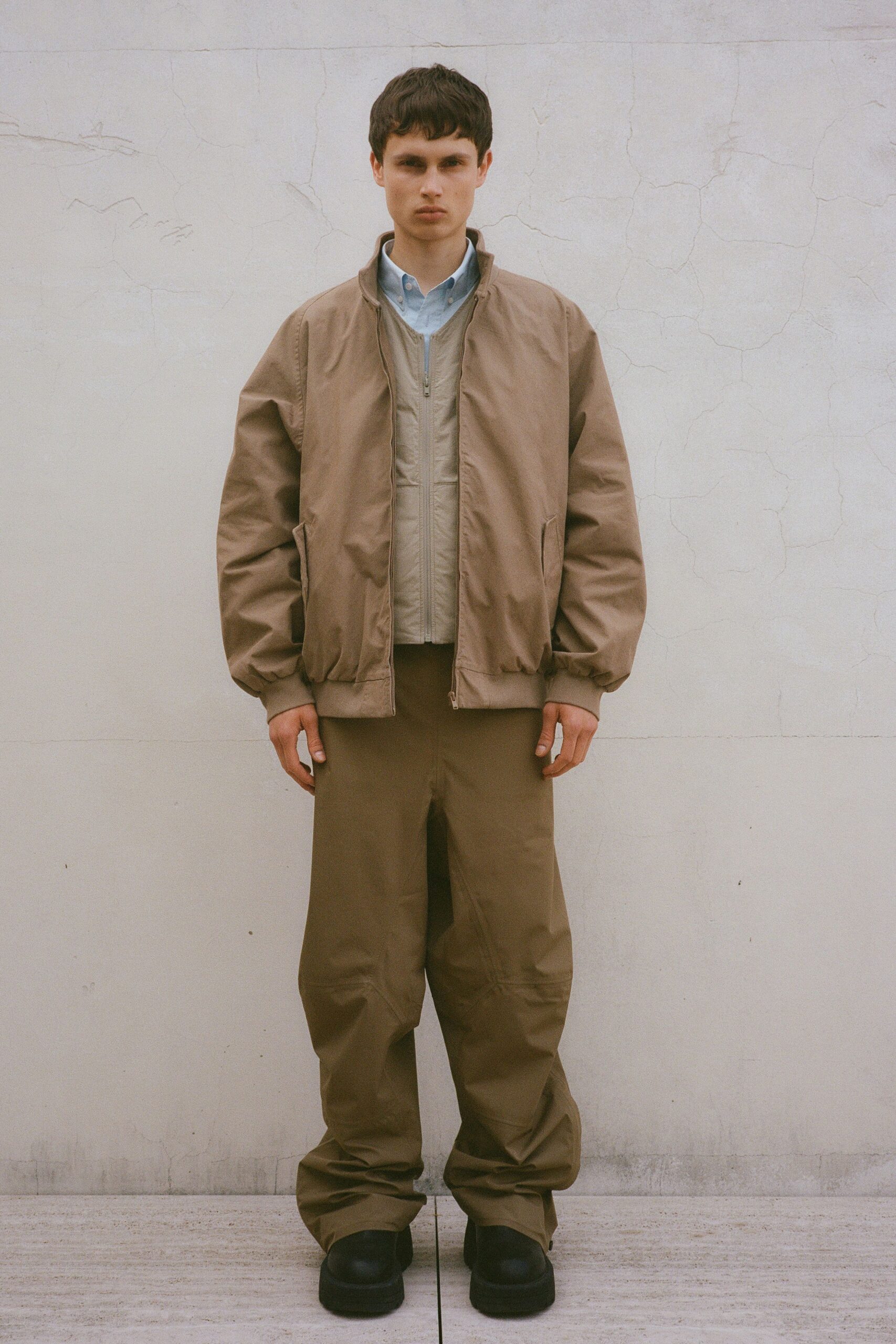 beige relaxed jacket with gray vest