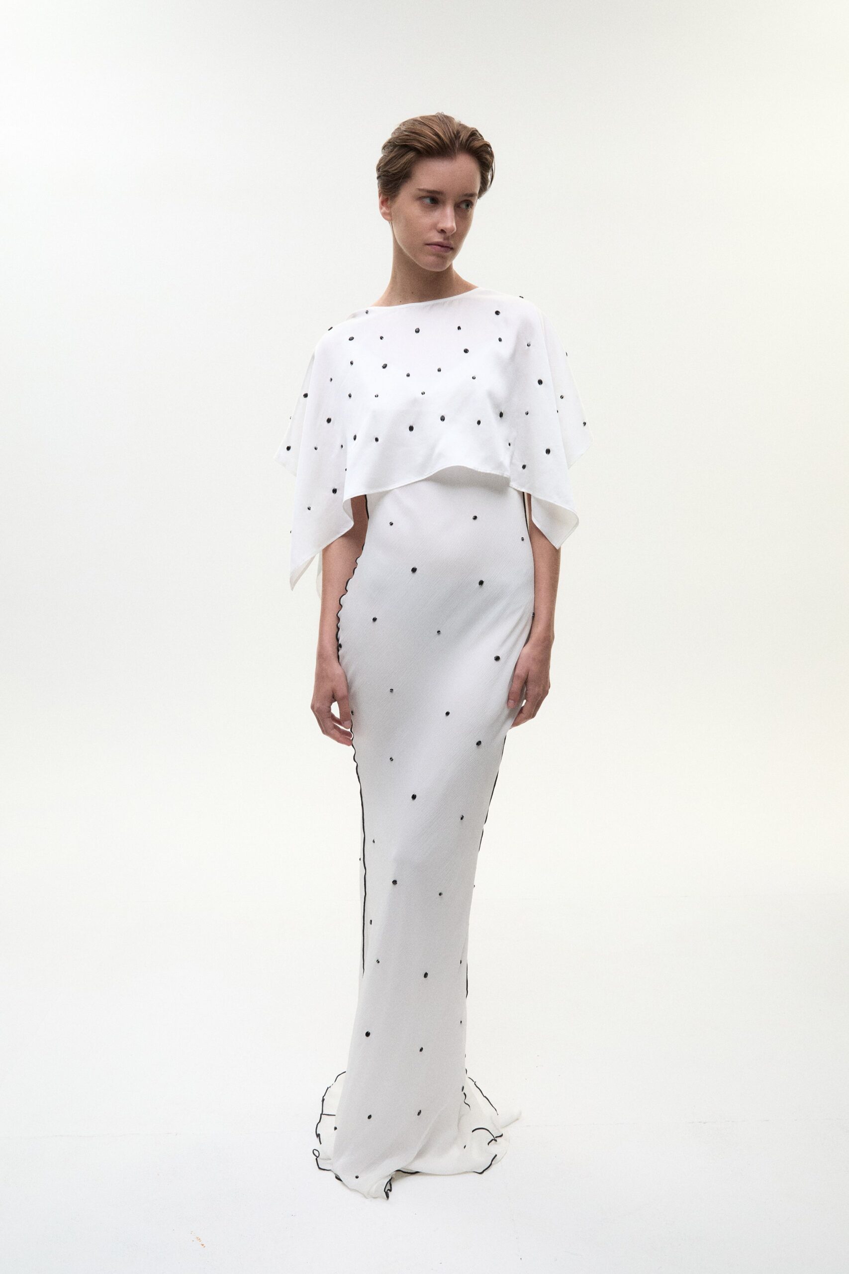 white silk embellished gown