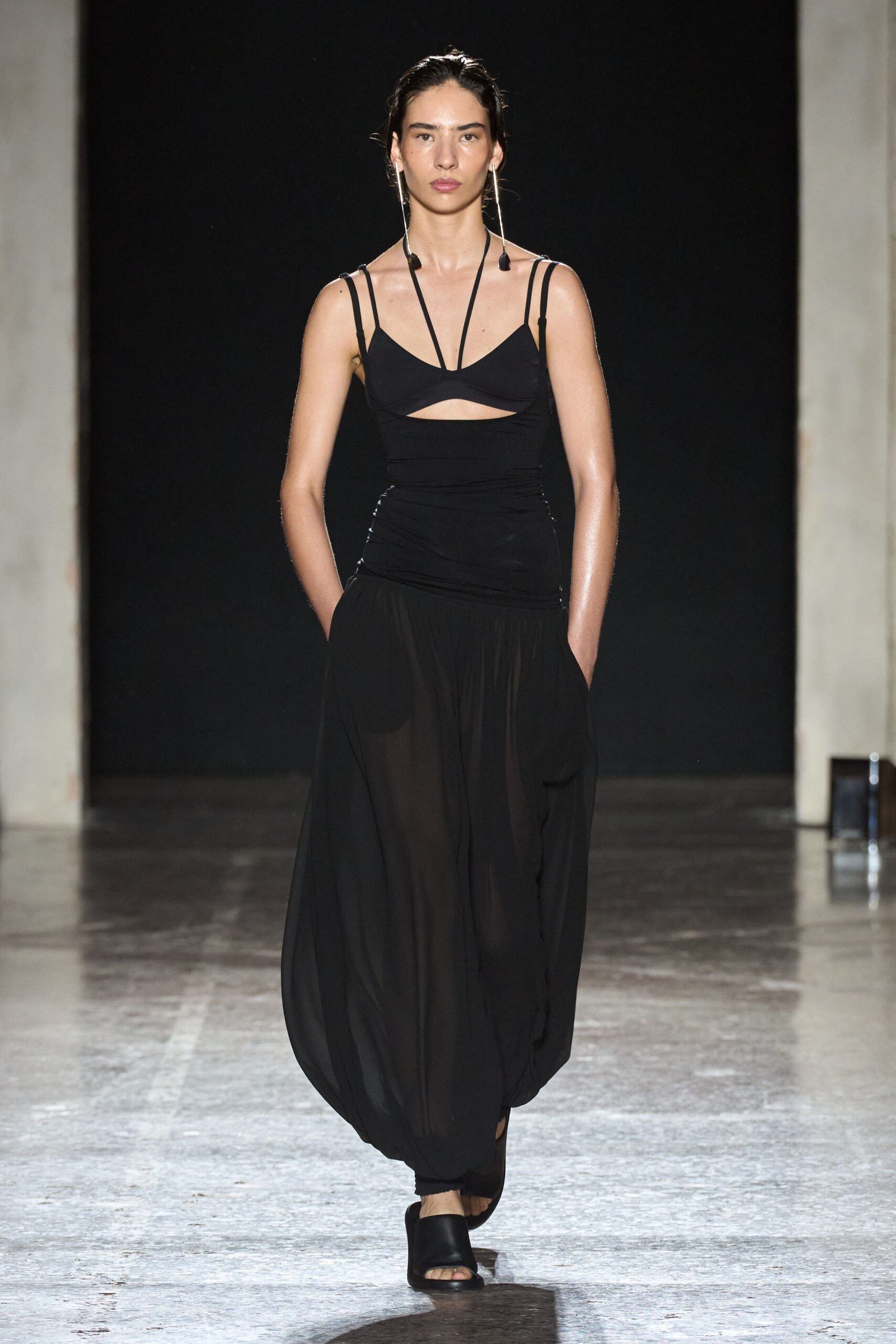 black fitted top and relaxed pants