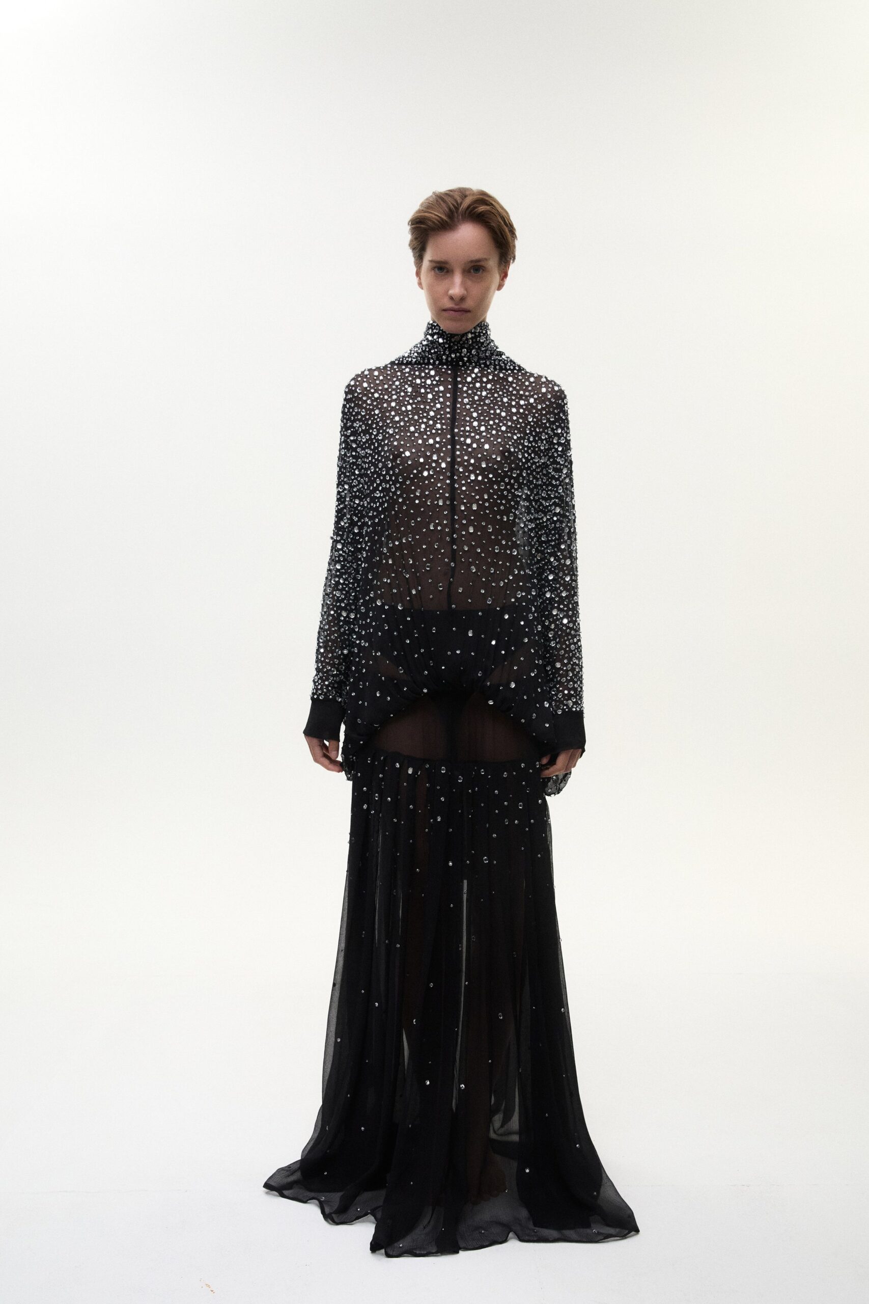 black sequined sheer gown