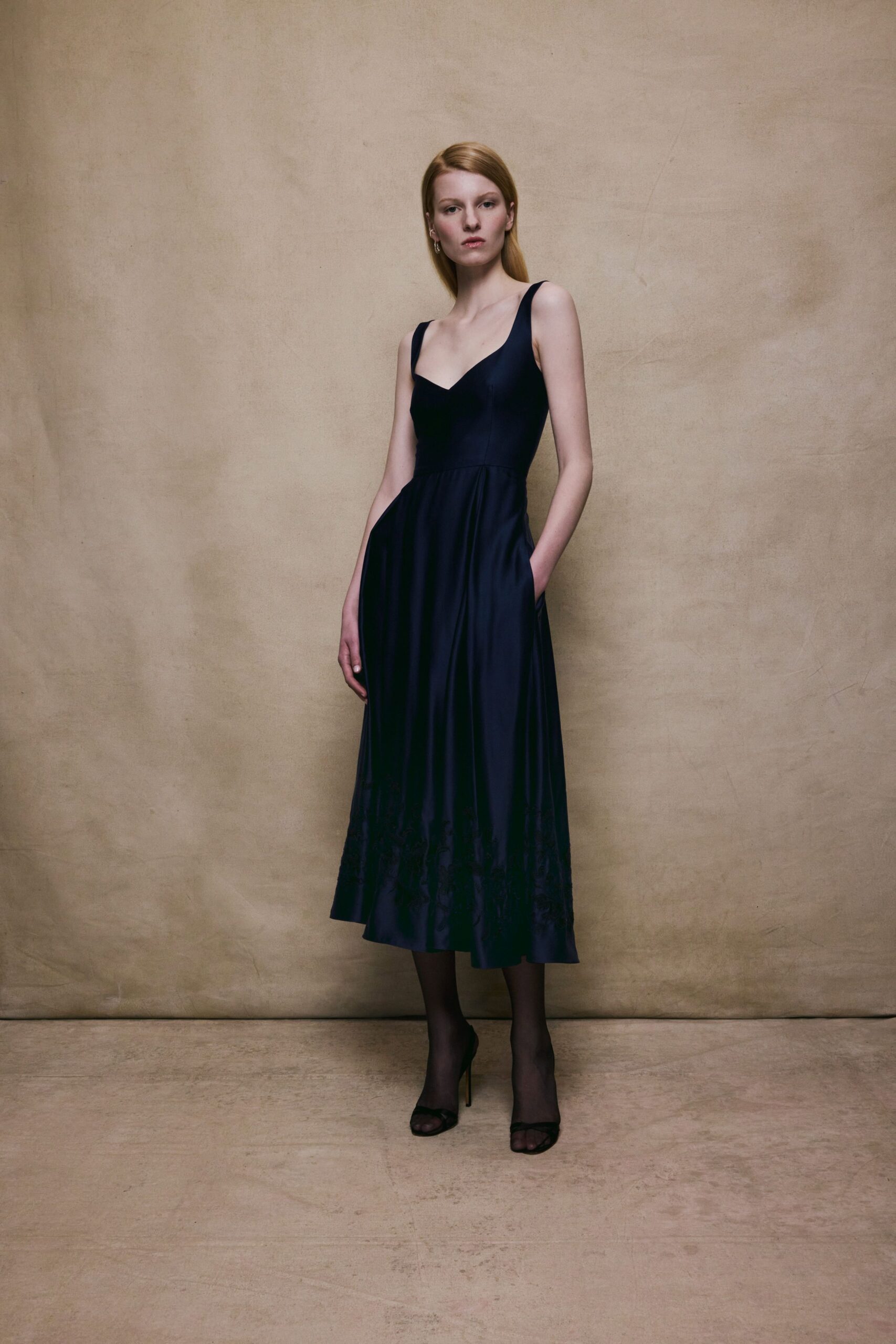 blue silk sleeveless v-neck fitted a-line pleated dress