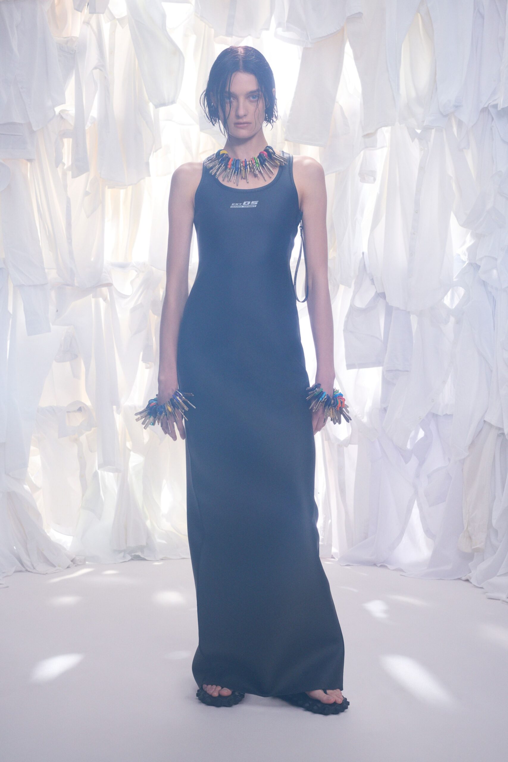 black neoprene sleeveless high-neck fitted maxi gown