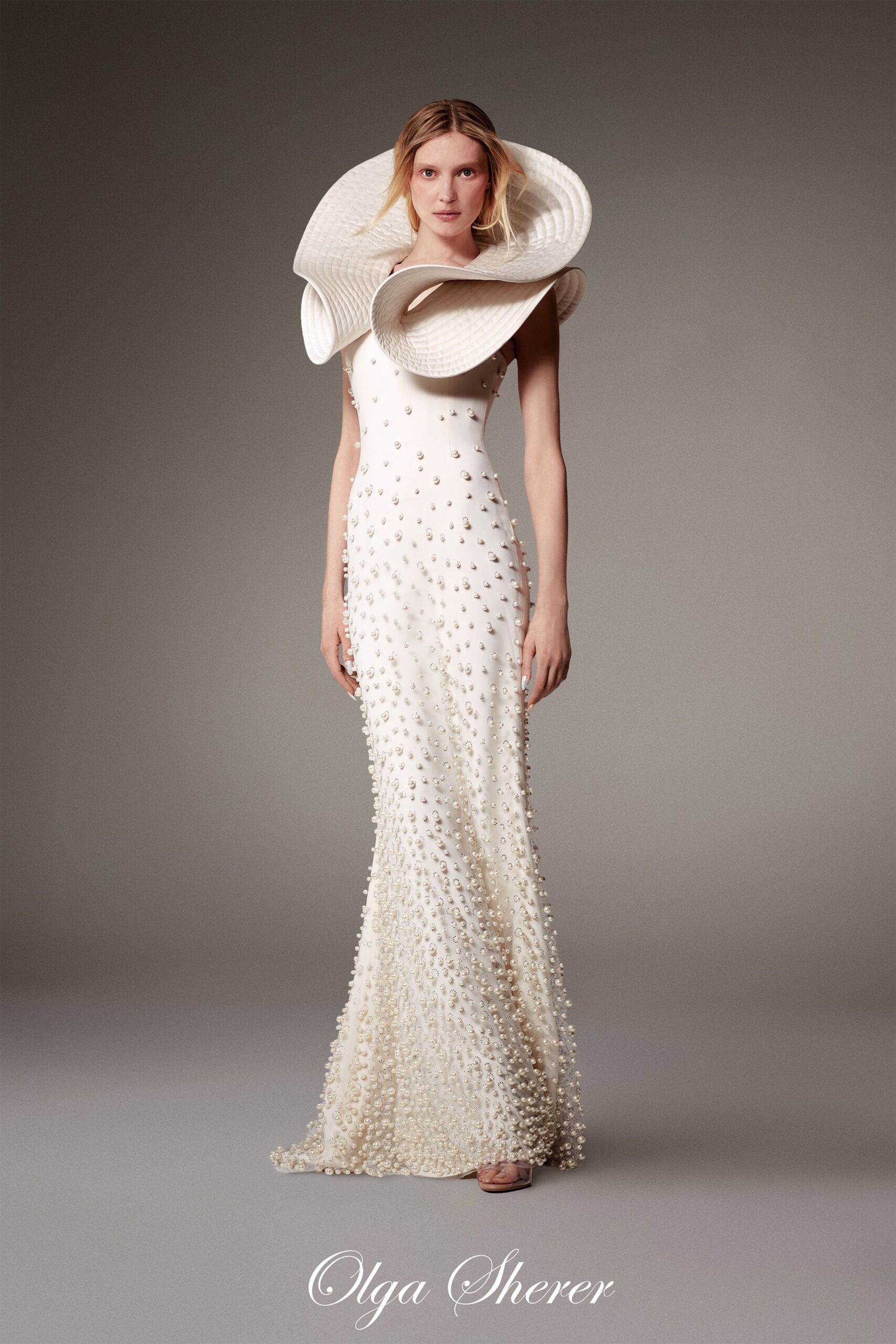 white beaded sleeveless gown