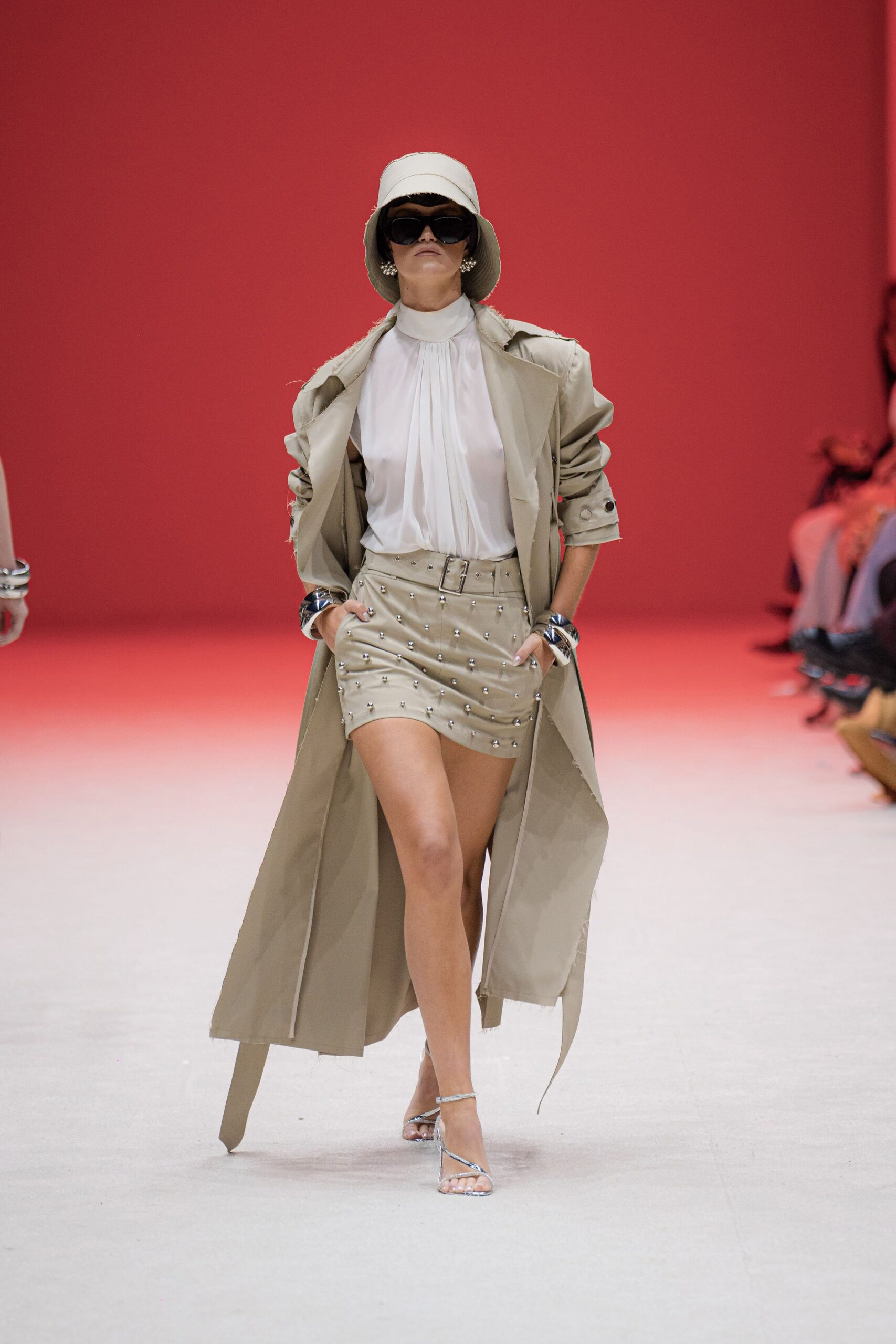beige trench coat with mini skirt