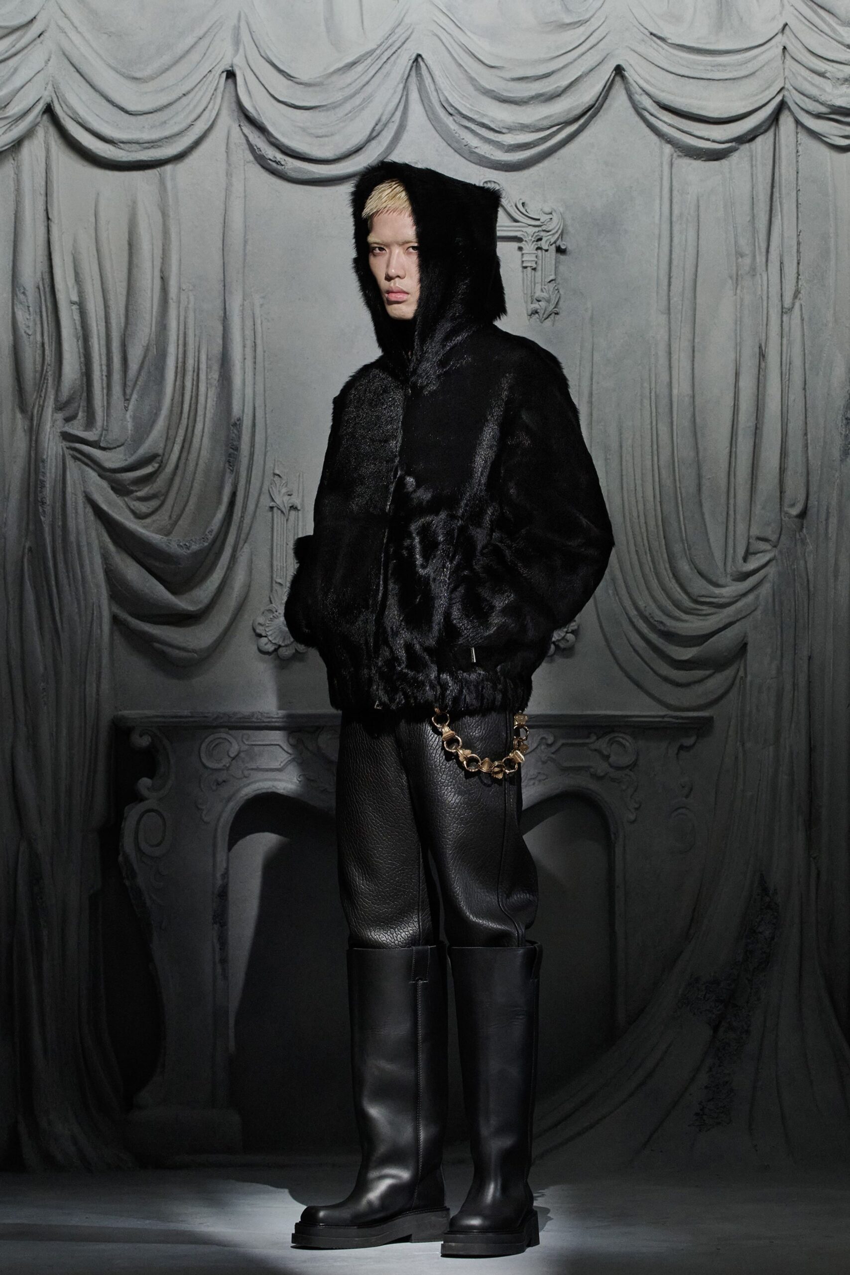 black faux-fur jacket with leather pants