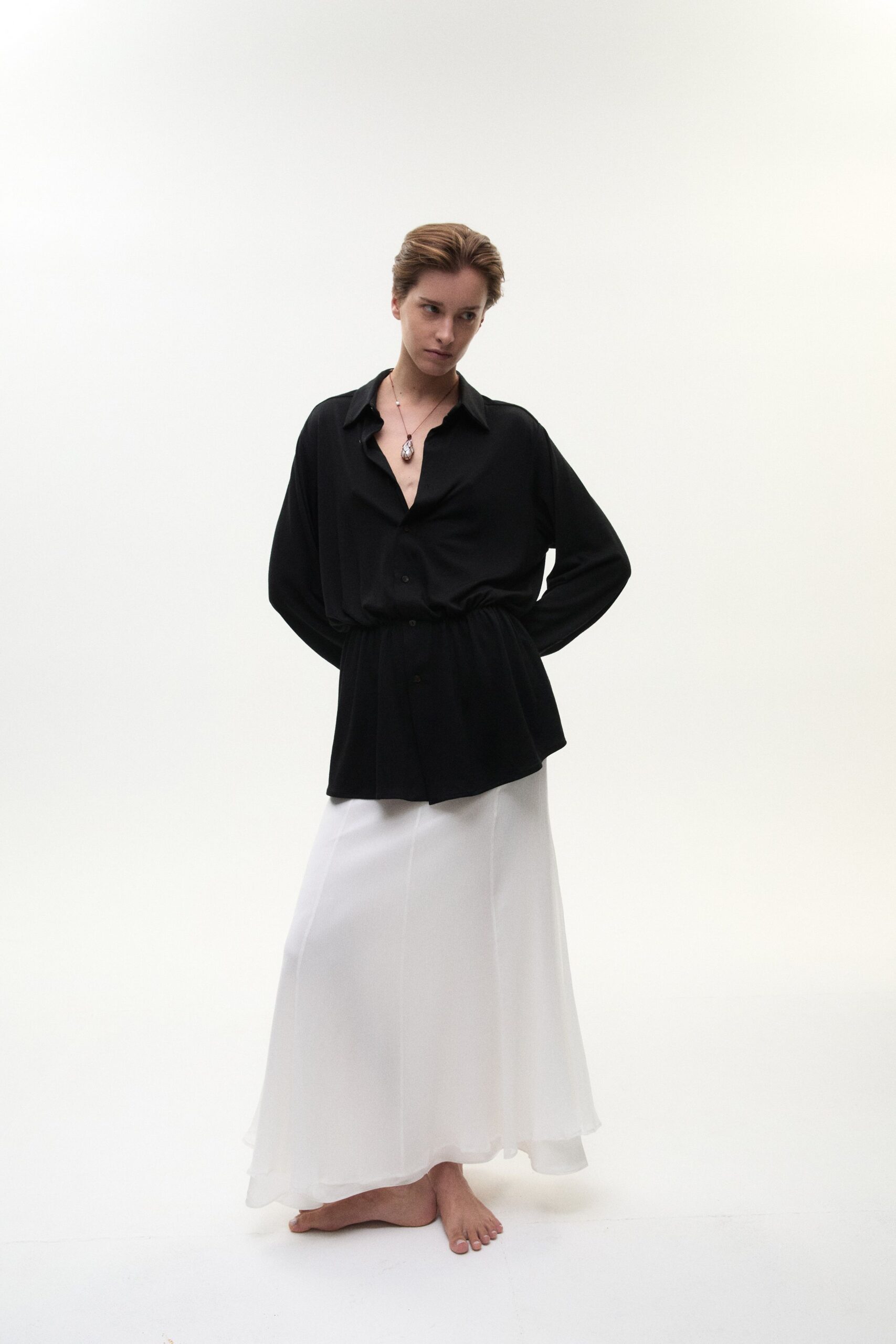 black shirt white maxi skirt