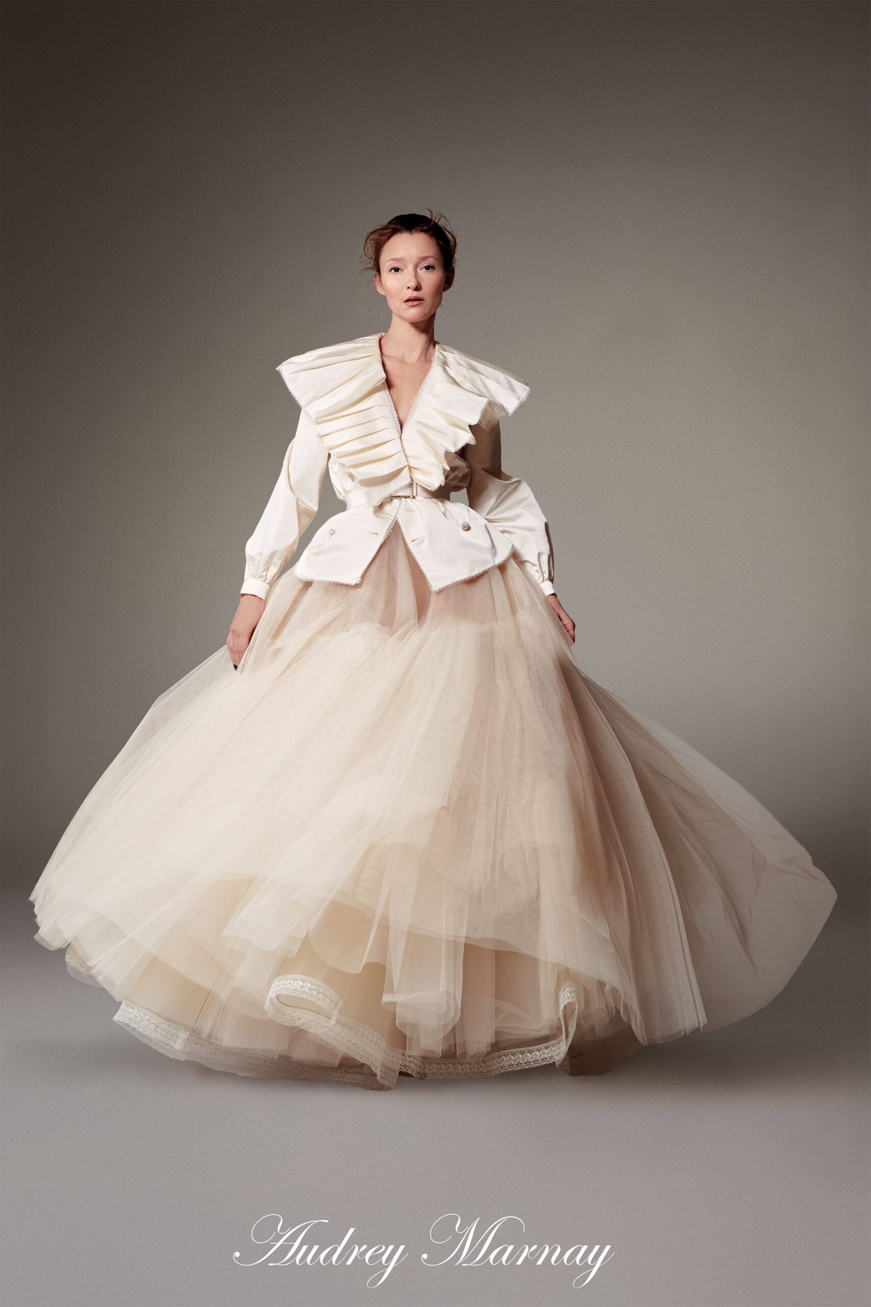 beige tulle long-sleeve collared fitted pleated layered gown